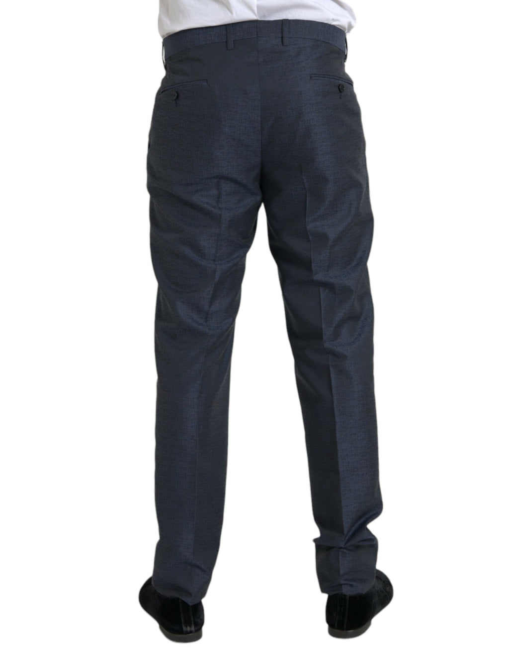 Pantalon homme Dolce & Gabbana en laine bleue, coupe skinny pour costume élégant, porté sur un modèle.