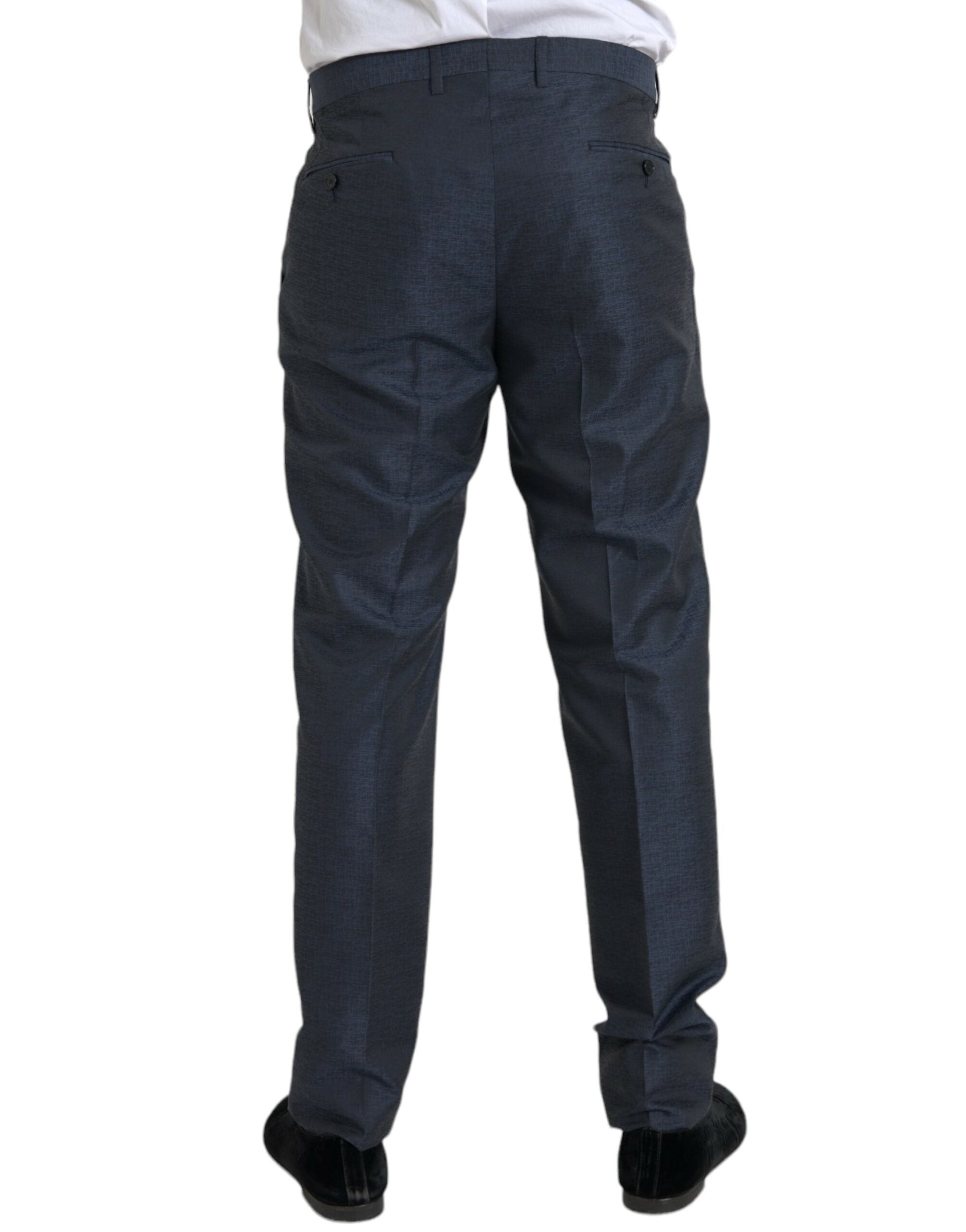 Pantalon homme Dolce & Gabbana en laine bleue, coupe skinny pour costume élégant, porté sur un modèle.