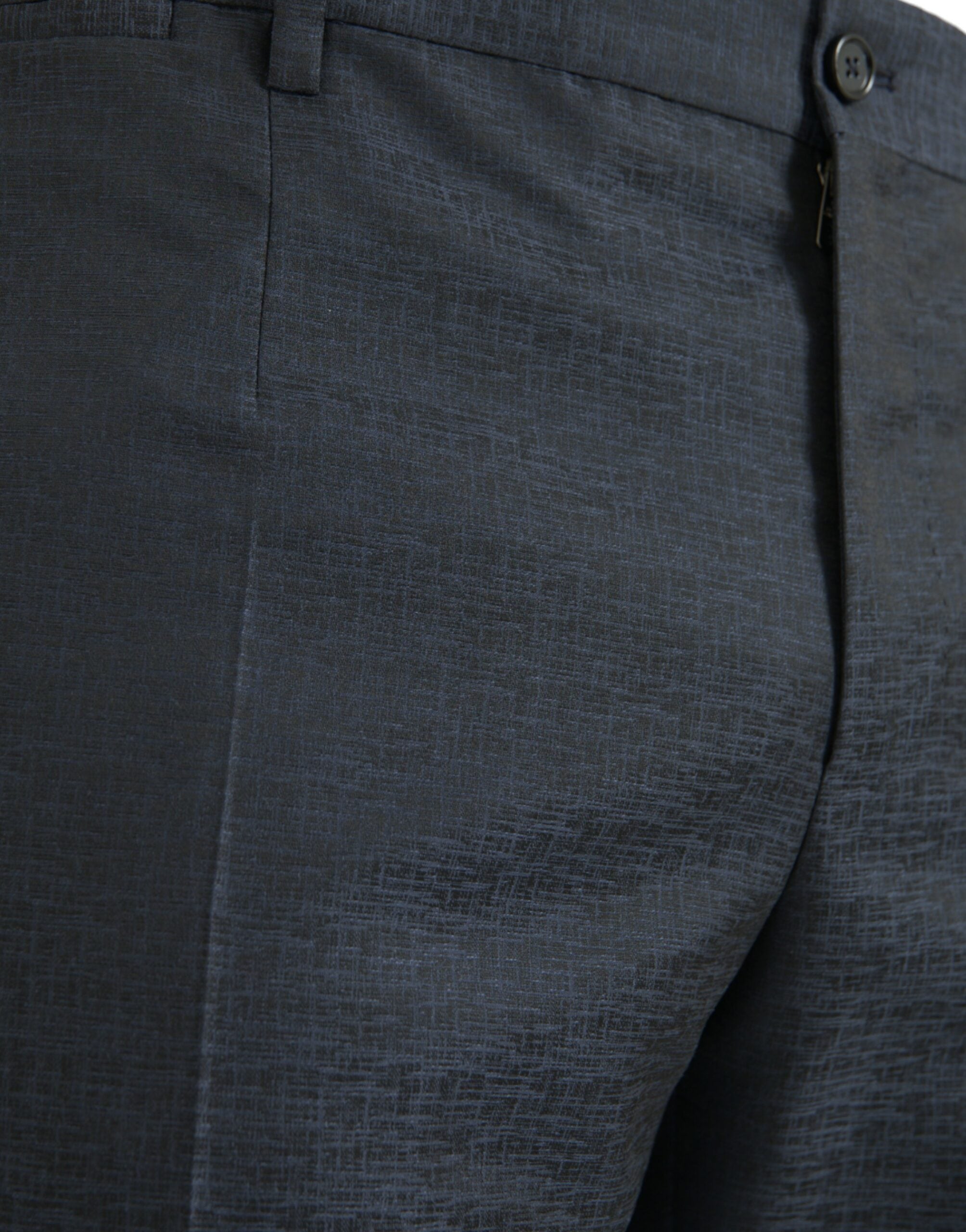 Pantalon habillé pour homme en laine bleue de marque Dolce & Gabbana, coupe skinny, style élégant et moderne.