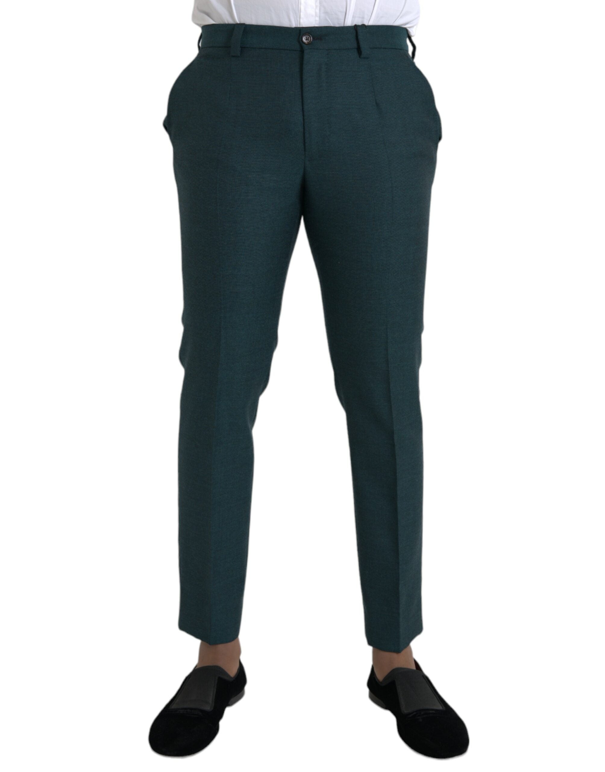Pantalons slim en laine verte Dolce & Gabbana, coupe ajustée et élégante, visibles avec détails de couture.