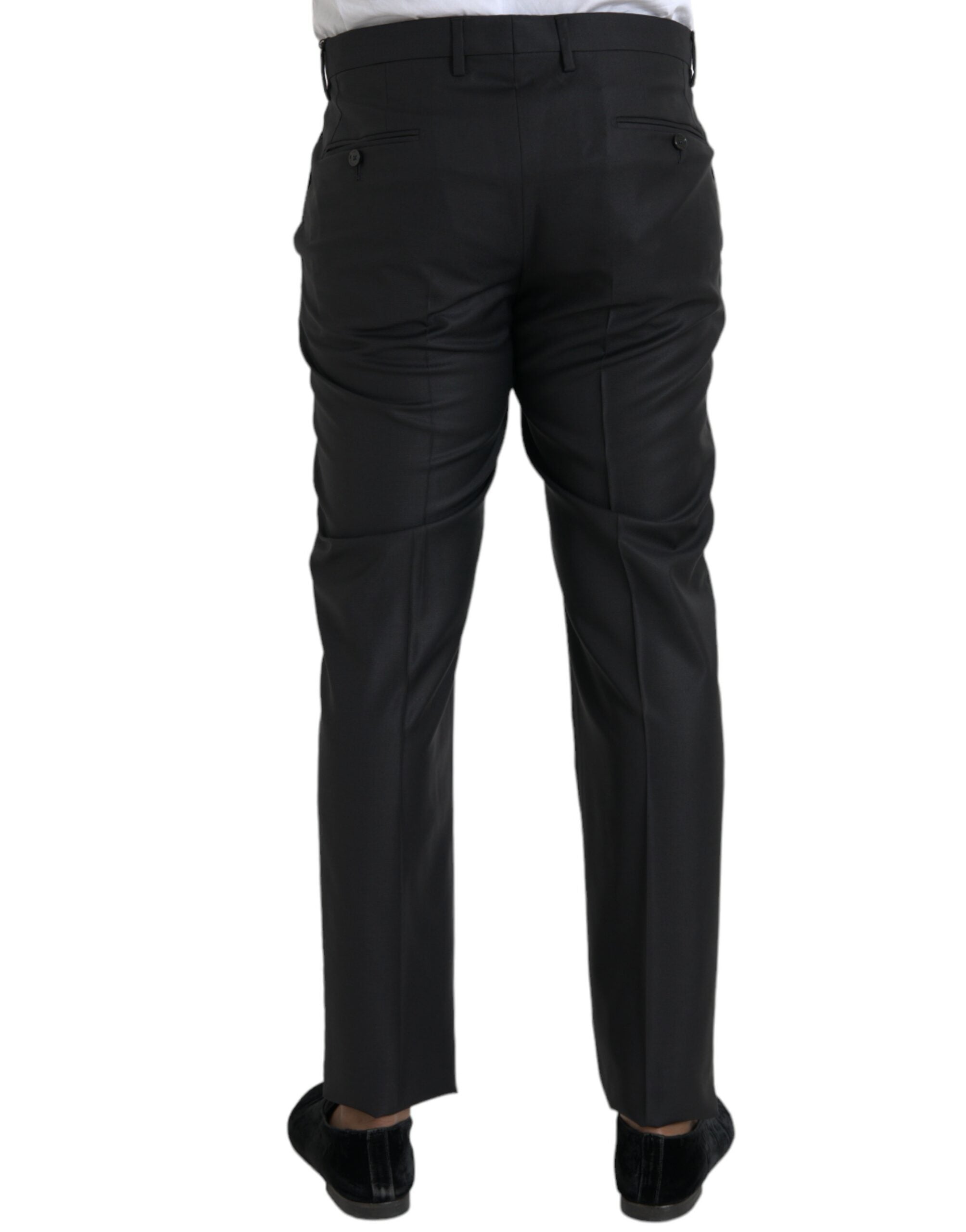 Pantalon skinny noir en laine et soie de Dolce & Gabbana, élégant et ajusté, visible en détail dans l'image.