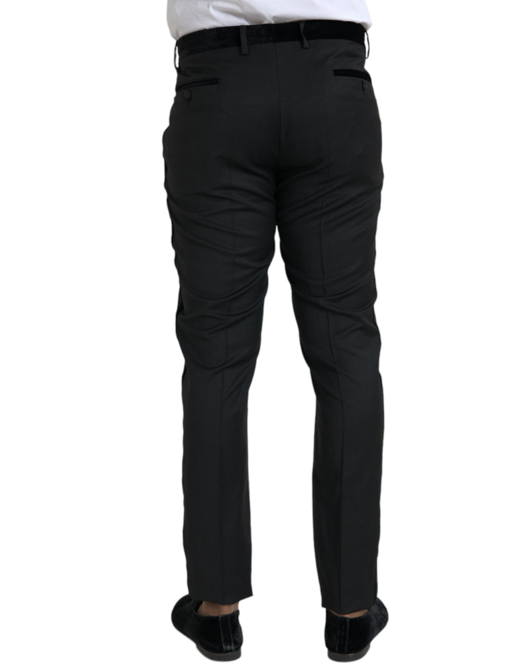 Pantalon homme skinny en soie noire de Dolce & Gabbana, style élégant et ajusté, visible en détail sur l'image.