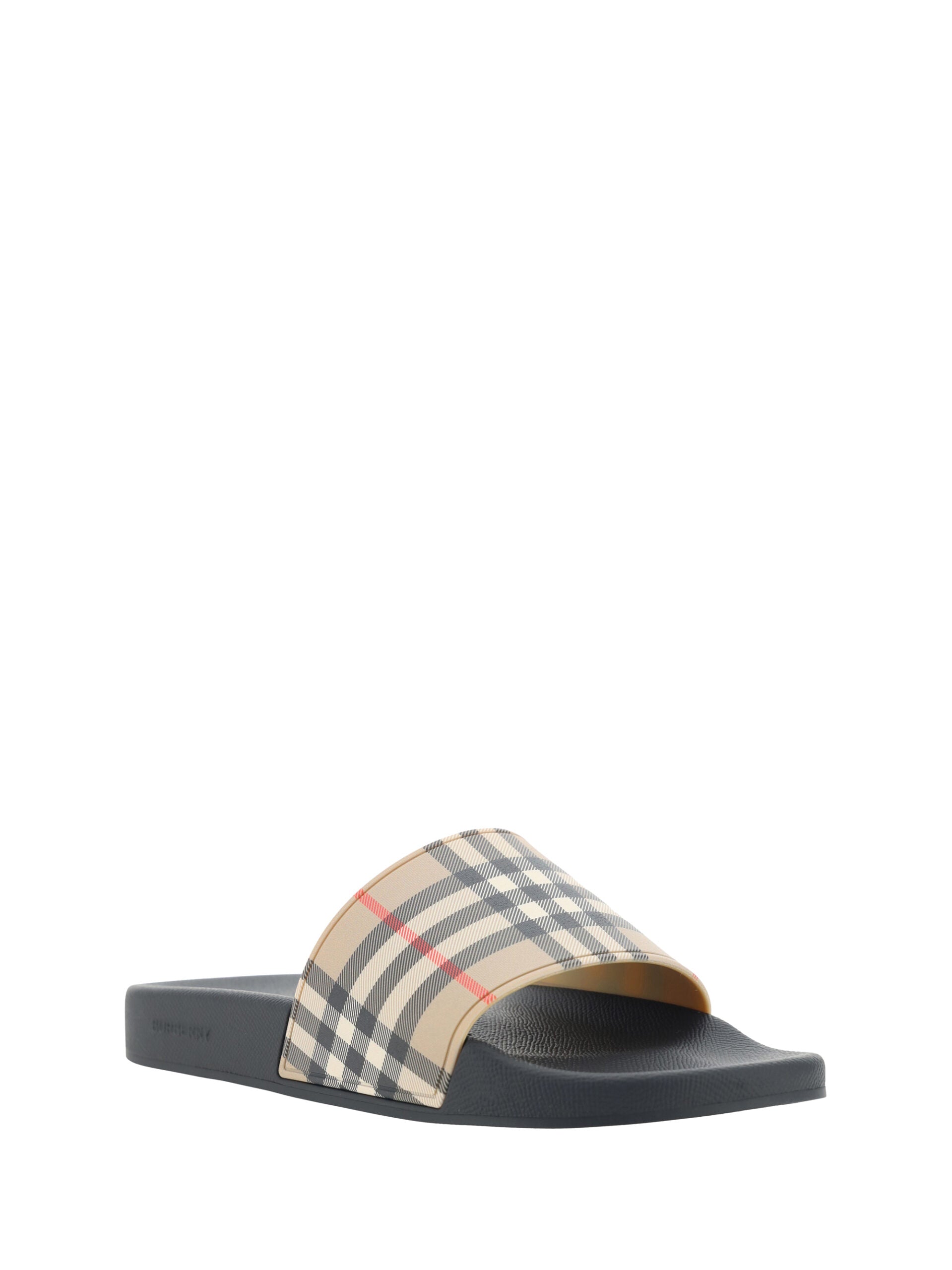 Sandales en caoutchouc marron Burberry, style slides, avec logo emblématique visible sur la bande frontale.
