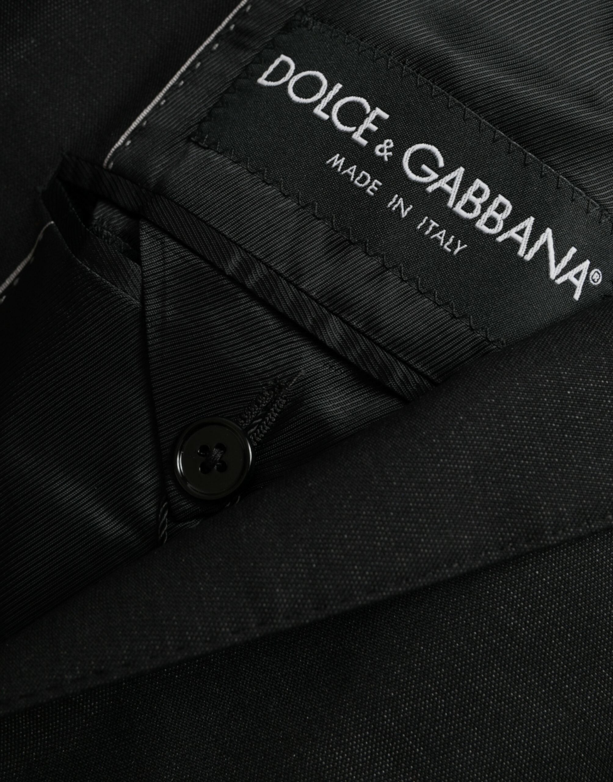 Manteau blazer noir en laine Dolce & Gabbana, coupe à col cranté, à un bouton, style élégant et classique.