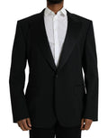 Blazer noir Dolce & Gabbana SICILIA à un seul boutonnage, détail élégant, porté sur un mannequin.