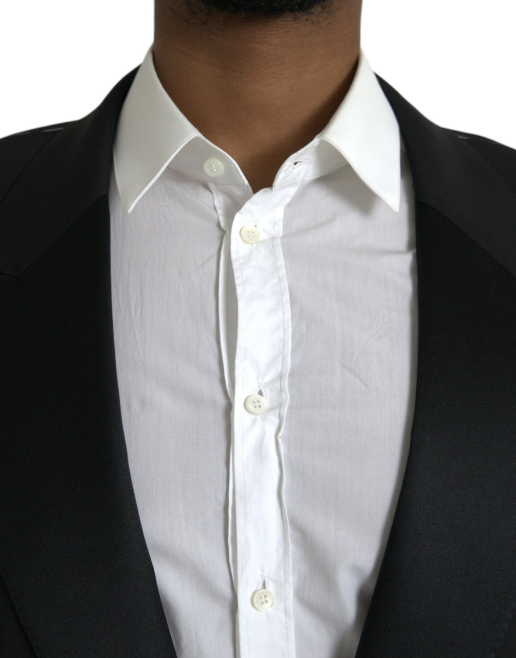 Manteau blazer noir Dolce & Gabbana Sicilia à un seul bouton, coupe élégante et matière de qualité visible sur l'image.