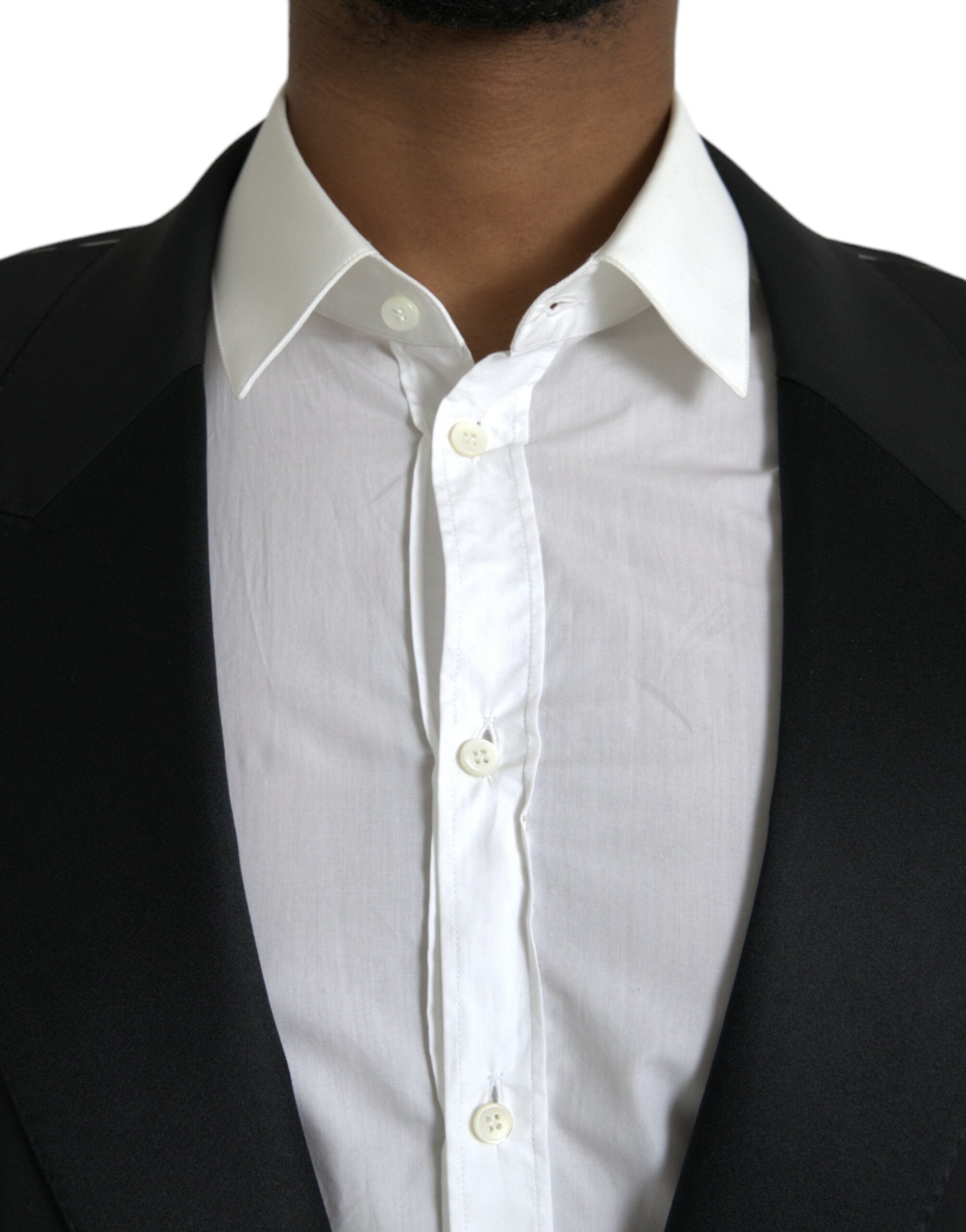 Manteau blazer noir Dolce & Gabbana Sicilia à un seul bouton, coupe élégante et matière de qualité visible sur l'image.