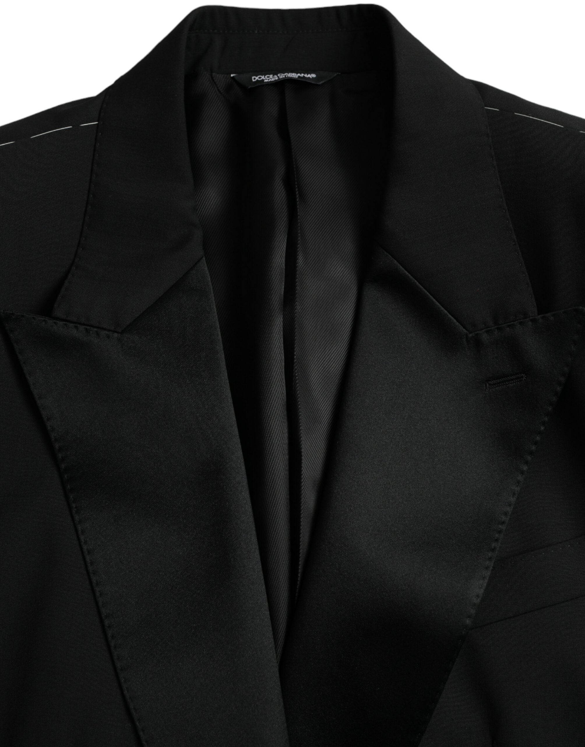 Manteau blazer noir Dolce & Gabbana Sicilia à simple boutonnage, élégante veste pour homme ou femme, détails sophistiqués visibles.