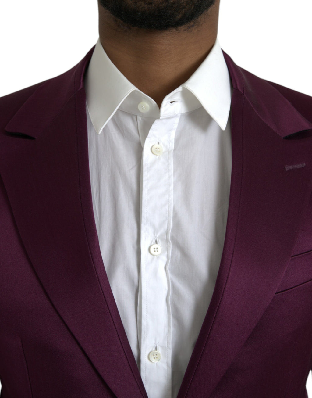 Manteau blazer en soie bordeaux Dolce & Gabbana, coupe simple et élégante, porté sur un mannequin.