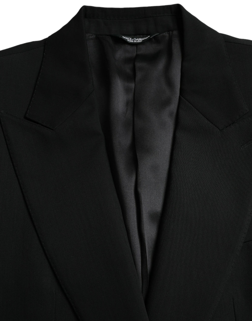 Manteau blazer noir en laine Dolce & Gabbana, coupe à un seul bouton, col cranté, style élégant et classique.