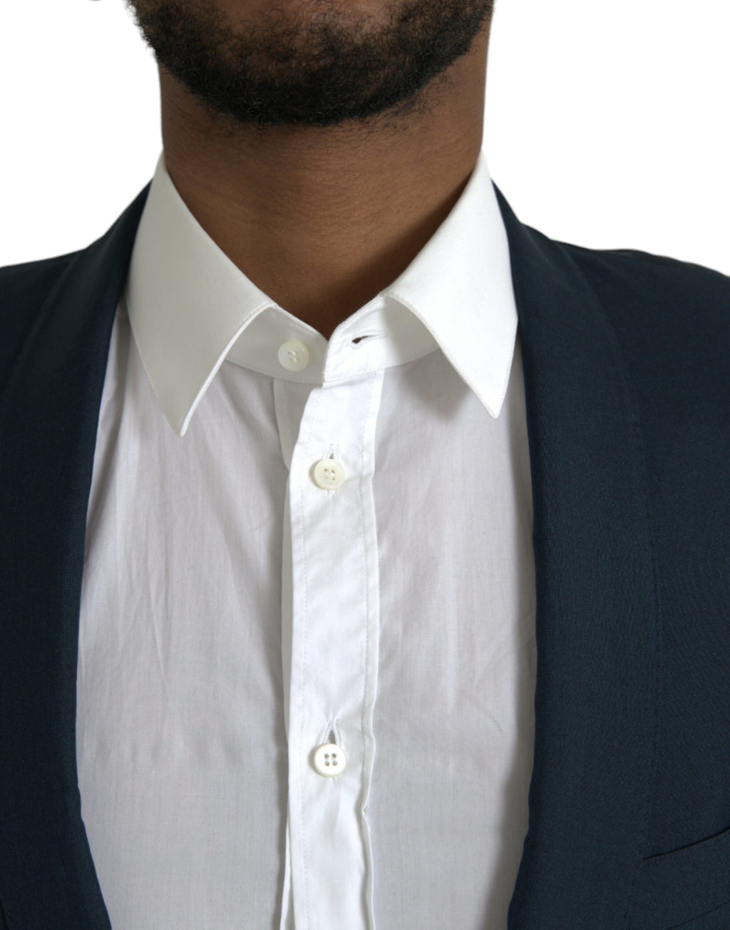 Manteau blazer bleu Dolce & Gabbana avec revers en or, à col classique et coupe ajustée, en tissu élégant.