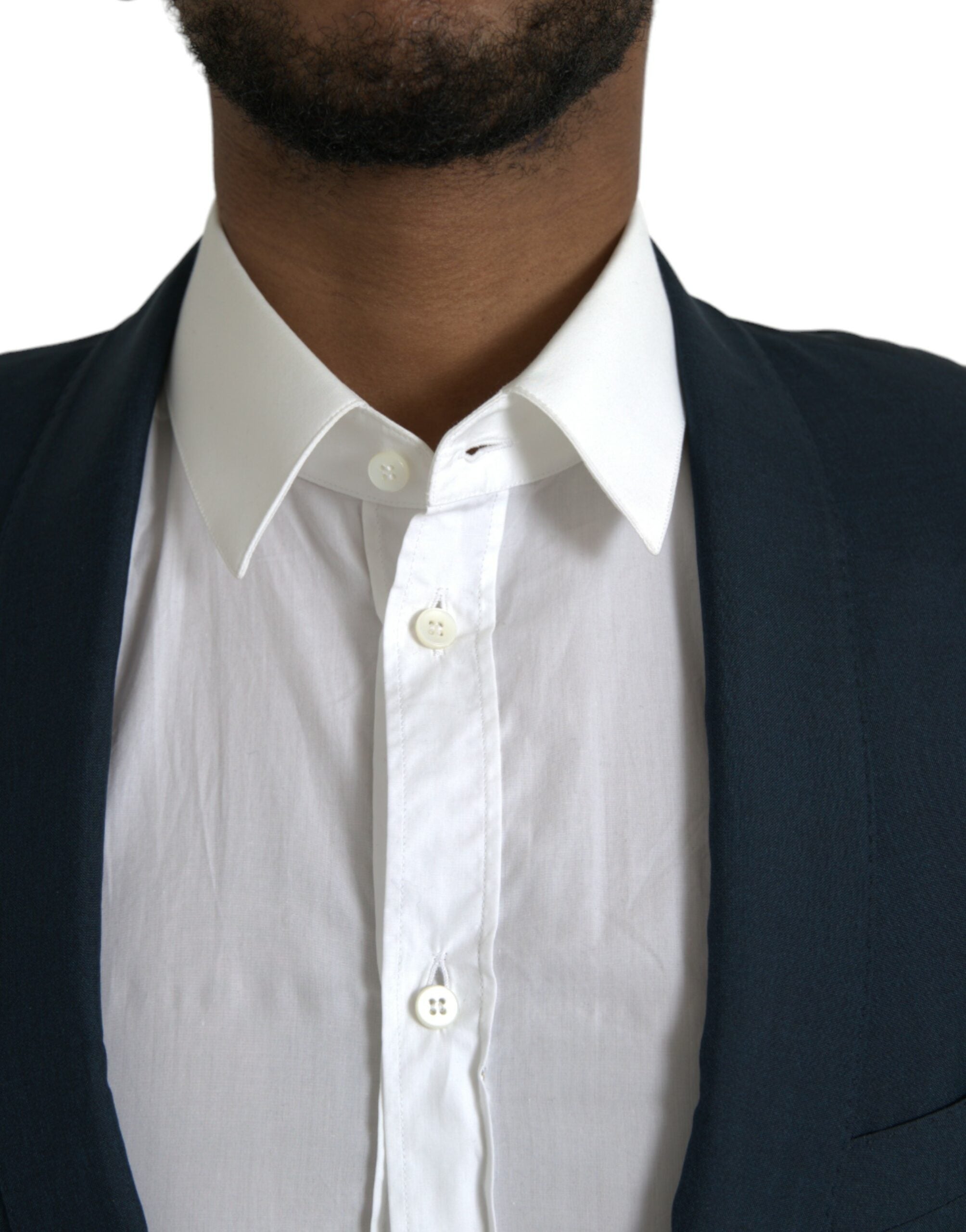 Manteau blazer bleu Dolce & Gabbana avec revers en or, à col classique et coupe ajustée, en tissu élégant.