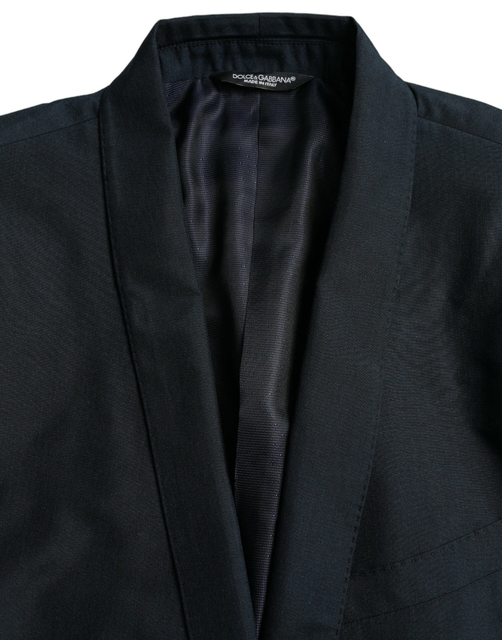 Manteau blazer bleu avec garniture dorée à col cranté, Dolce & Gabbana, coupe simple et élégante, en tissu de qualité.