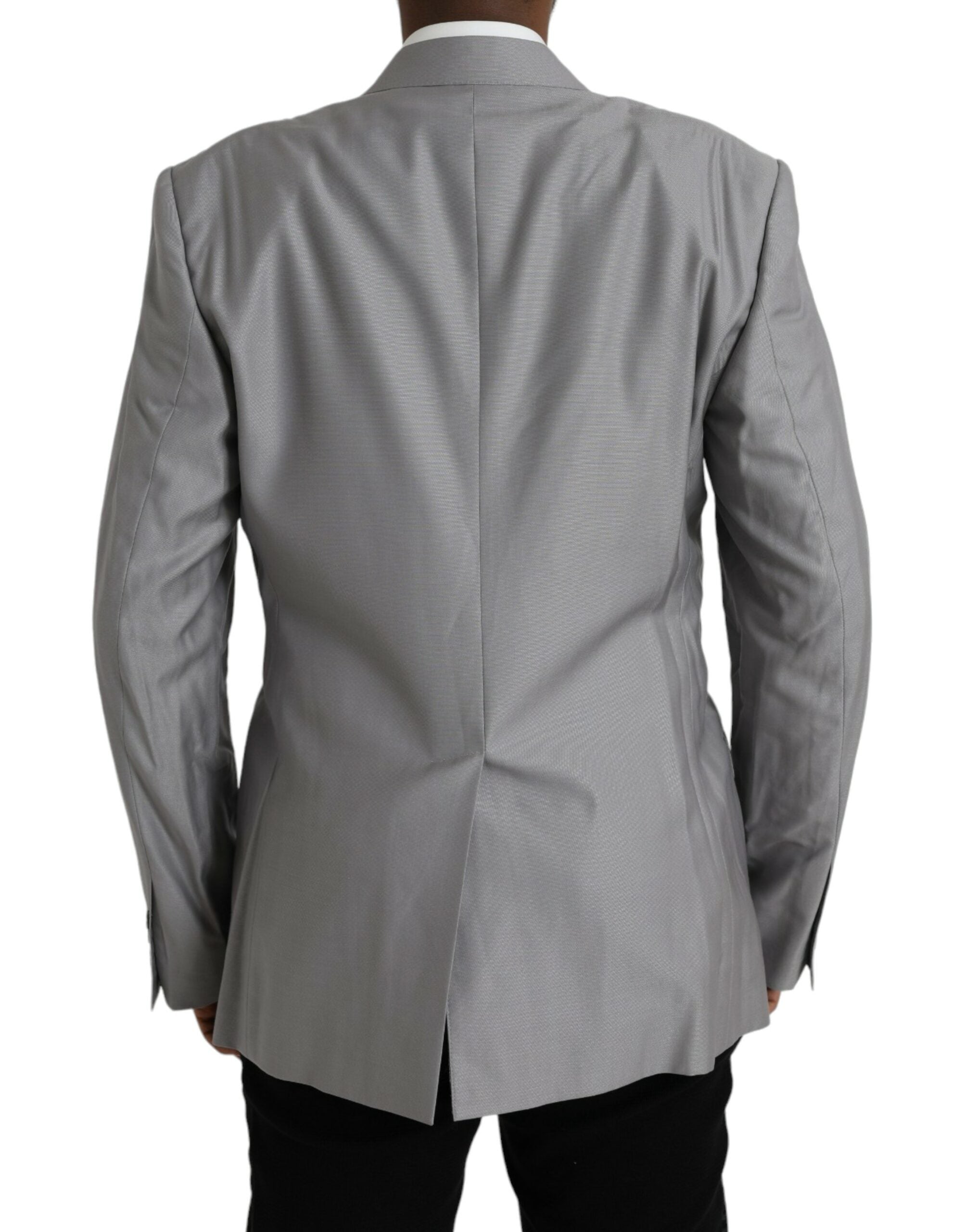 Manteau gris en laine Dolce & Gabbana, blazer à un seul bouton avec col pointu, porté sur un mannequin.