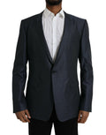 Manteau blazer en laine bleue Dolce & Gabbana à un bouton avec détails dorés, coupe classique et élégante.