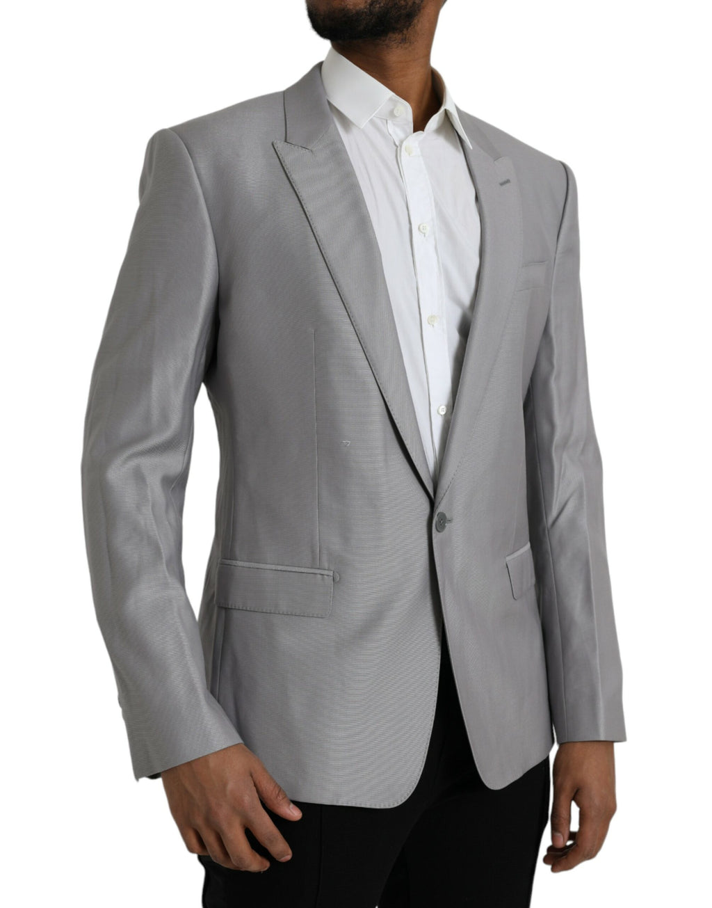 Manteau gris en laine Dolce & Gabbana, blazer à col cranté, coupe classique avec boutonnières simples.