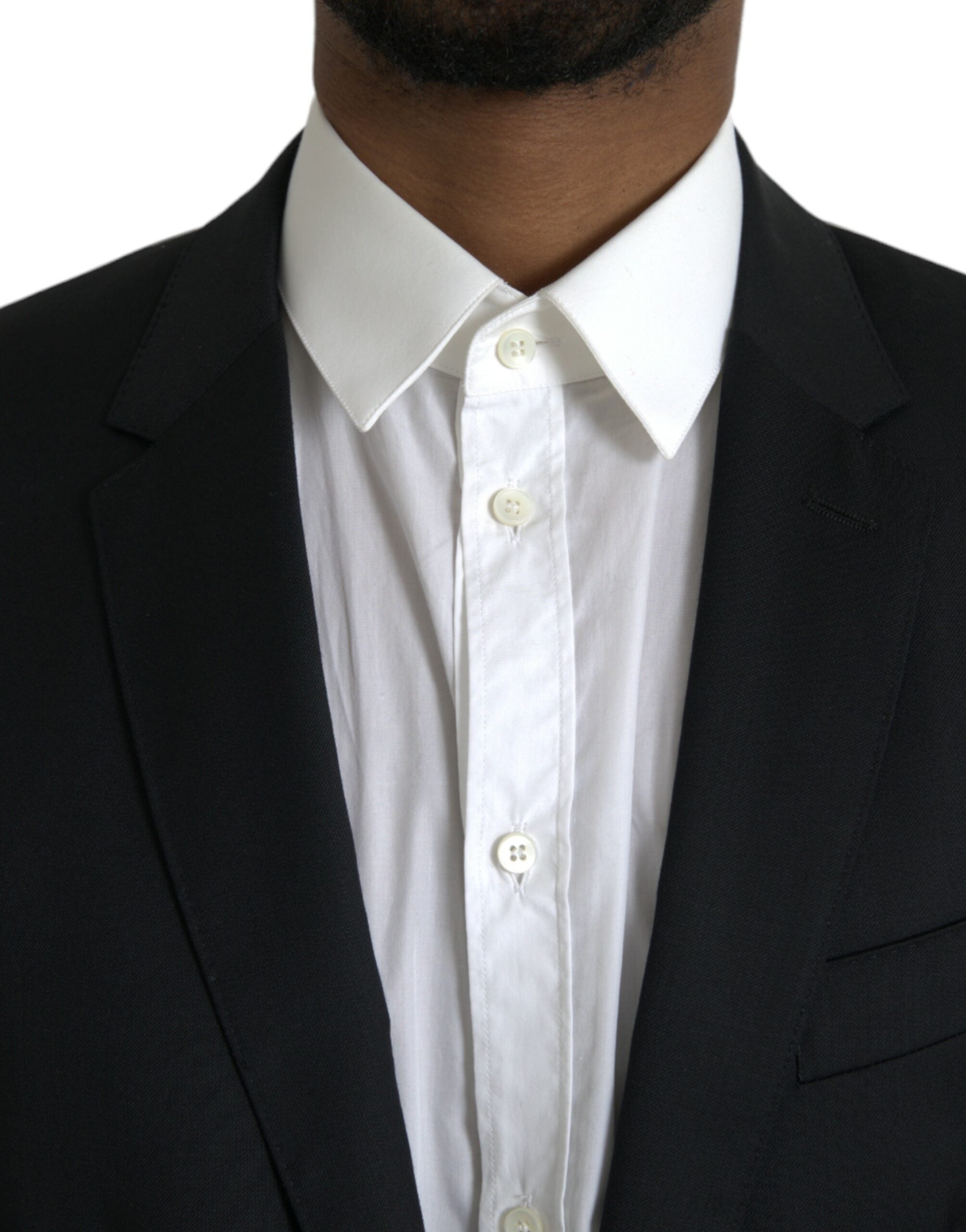 Veste blazer noire en laine Dolce & Gabbana, coupe simple boutonnage unique, élégante et sophistiquée.
