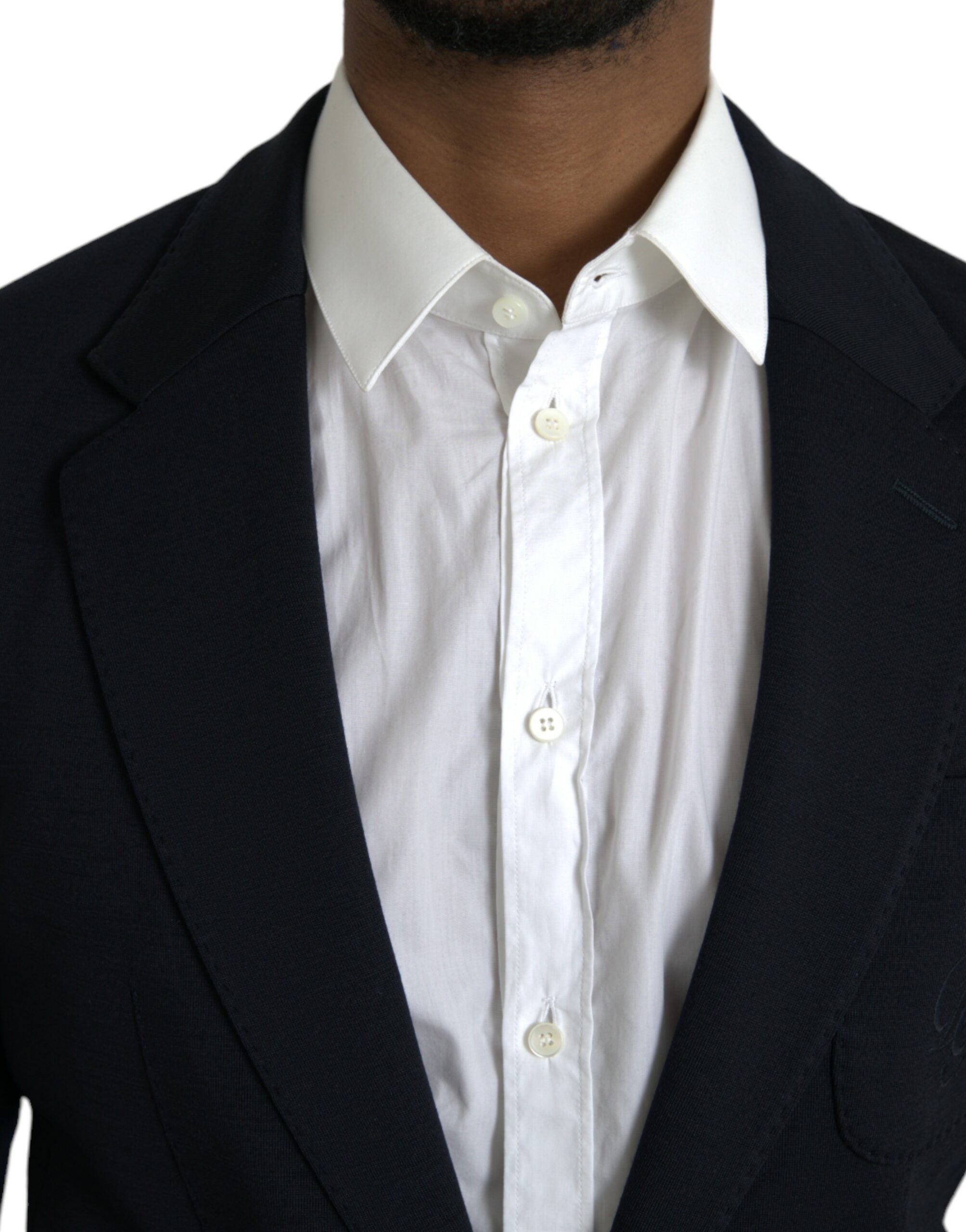 Manteau blazer noir en laine Dolce & Gabbana à col à revers et coupe croisée, aspect élégant et sophistiqué.