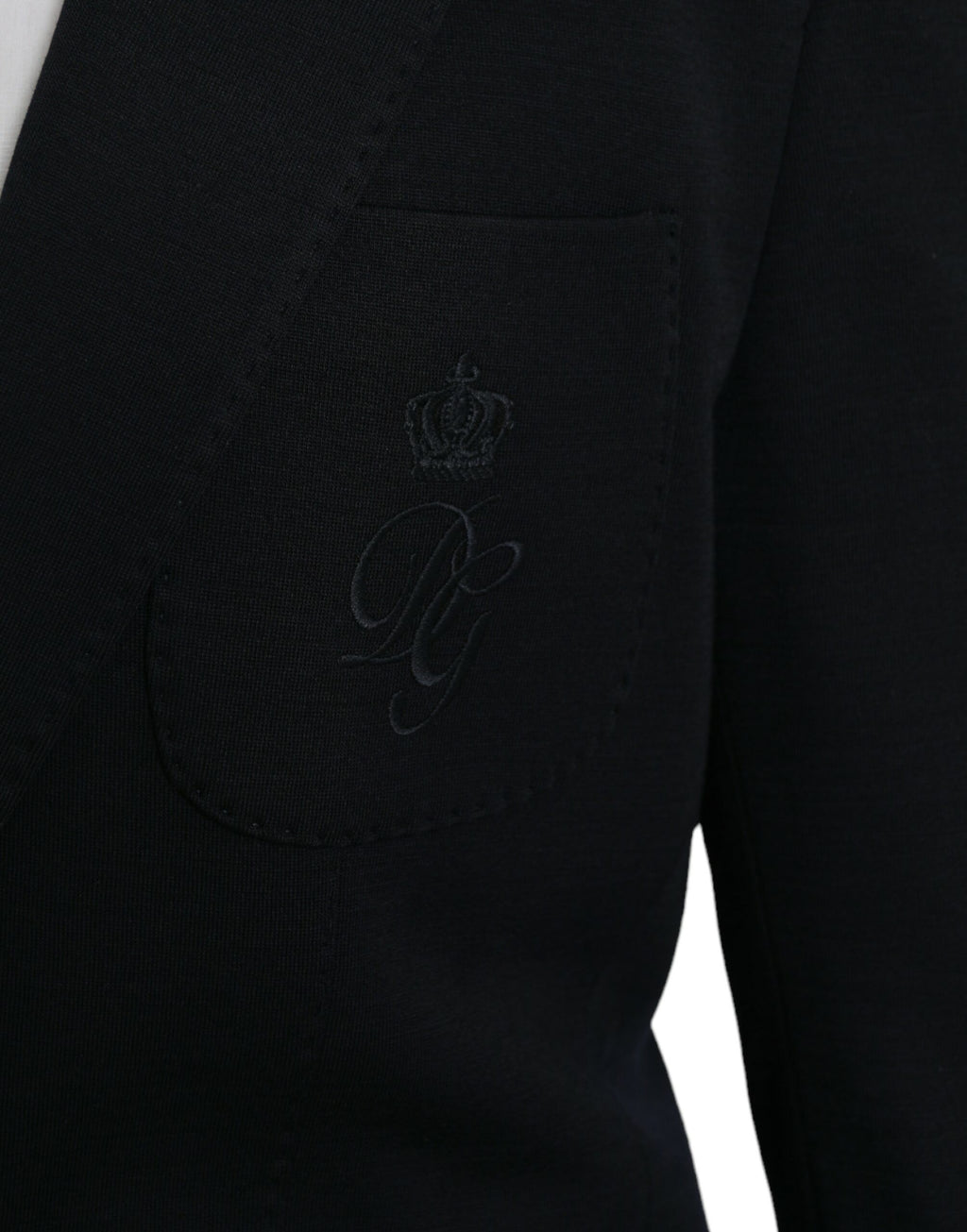 Manteau blazer en laine noire Dolce & Gabbana, coupe à revers, à un seul boutonnage, élégante veste pour homme ou femme.