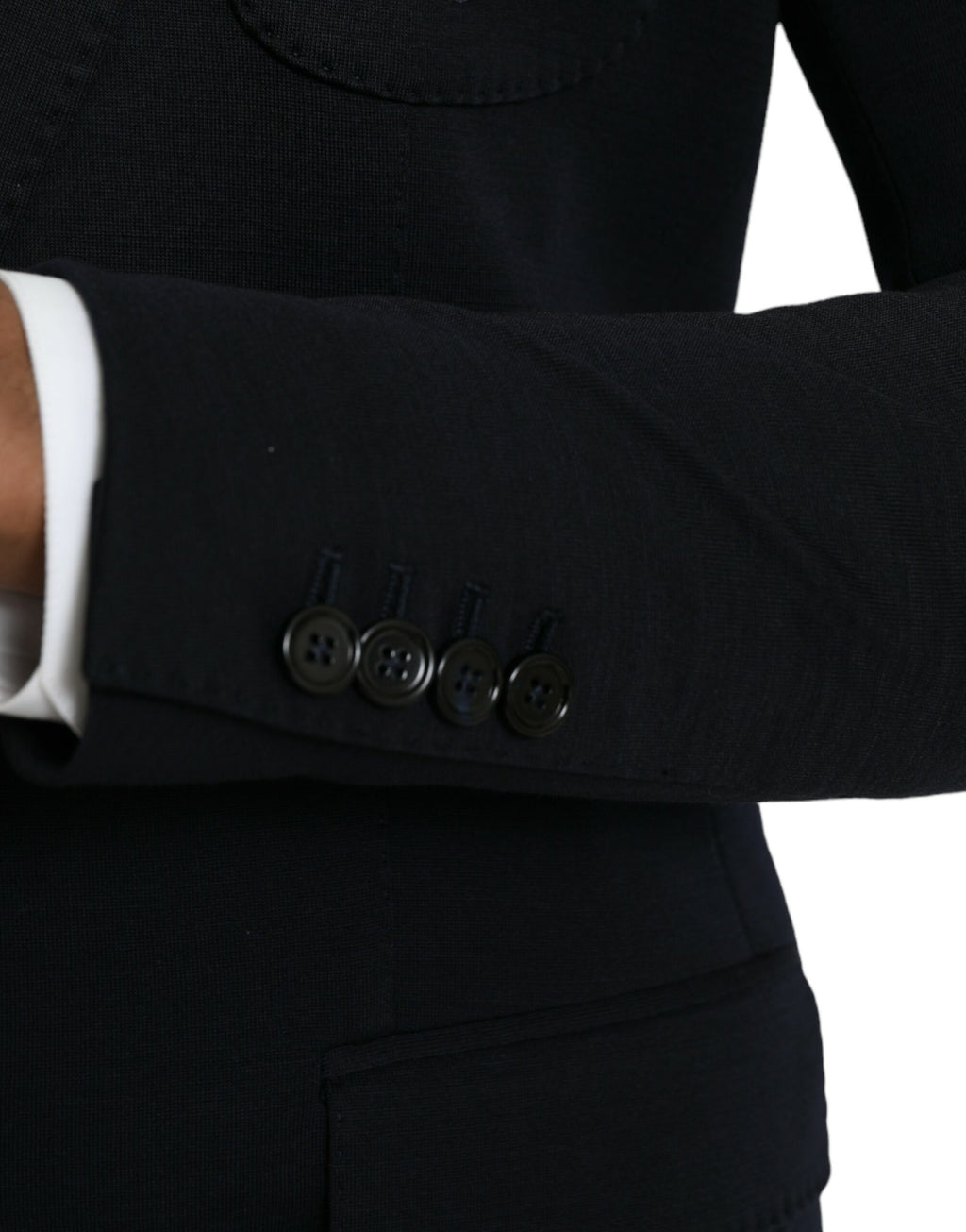 Manteau blazer en laine noire Dolce & Gabbana à col cranté et boutonnière simple, coupe élégante et moderne.