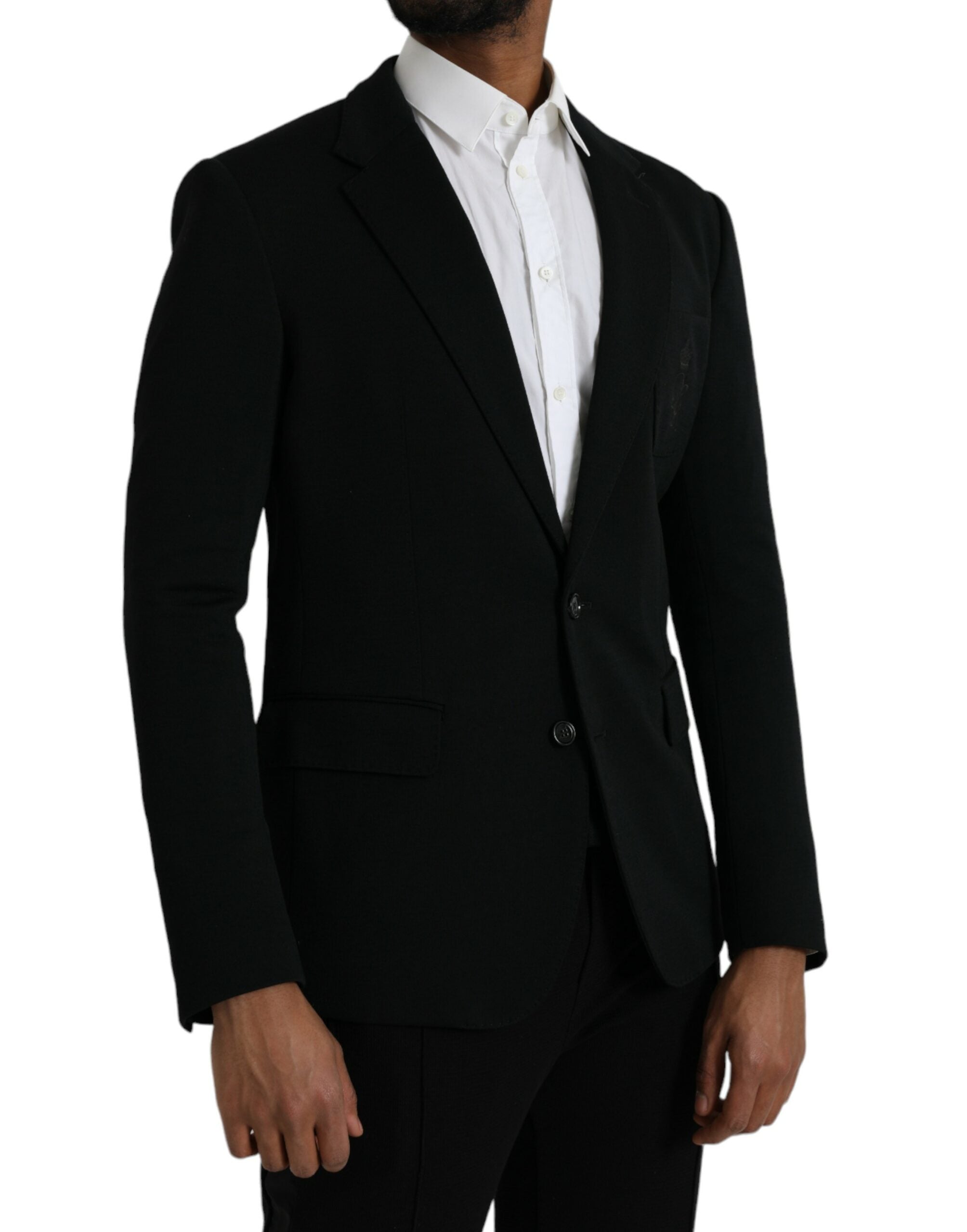 Manteau blazer noir en laine Dolce & Gabbana à boutons, coupe ajustée, col à revers, style élégant et classique.