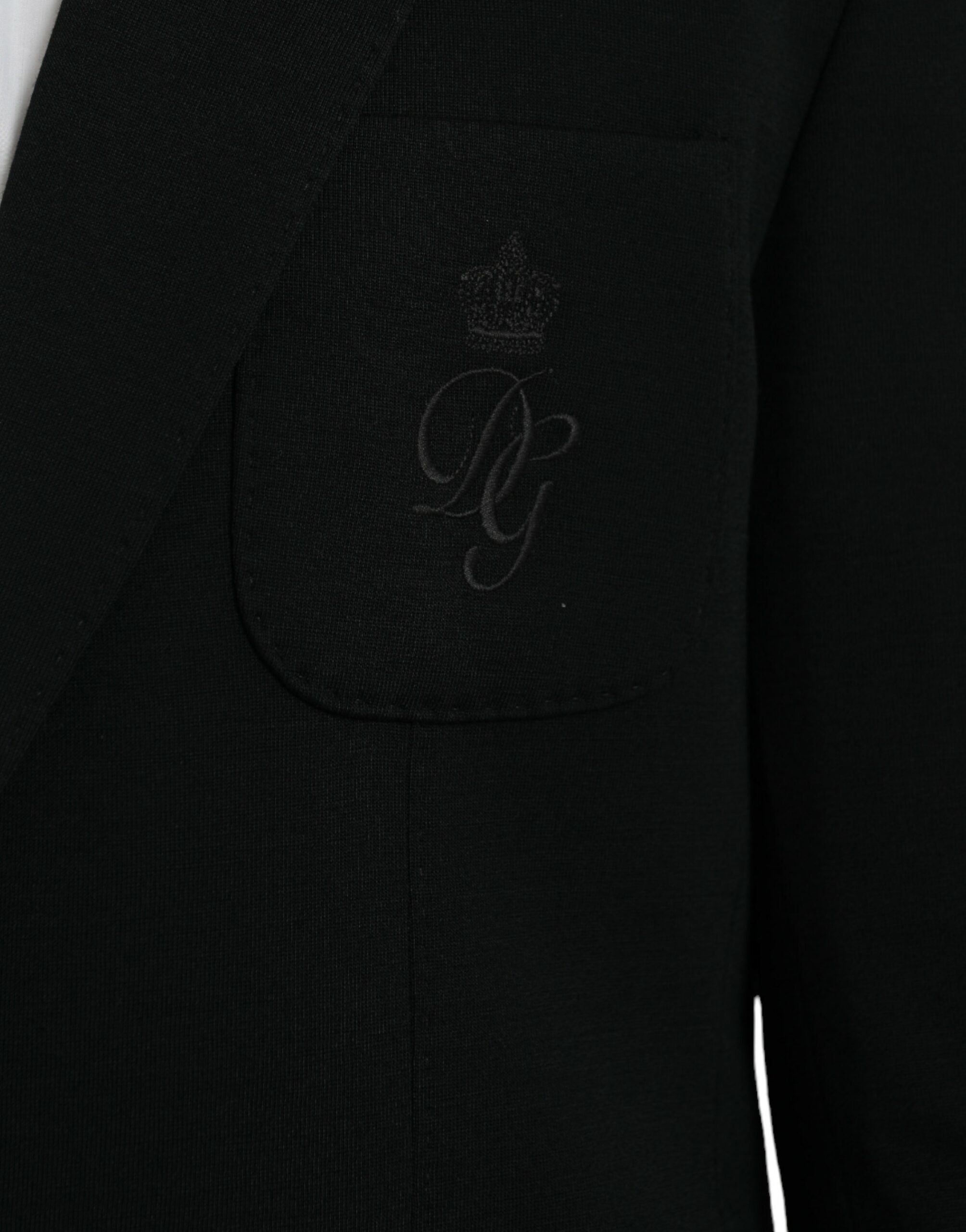 Manteau blazer noir en laine Dolce & Gabbana, à col cranté, à simple boutonnage, vue de face.