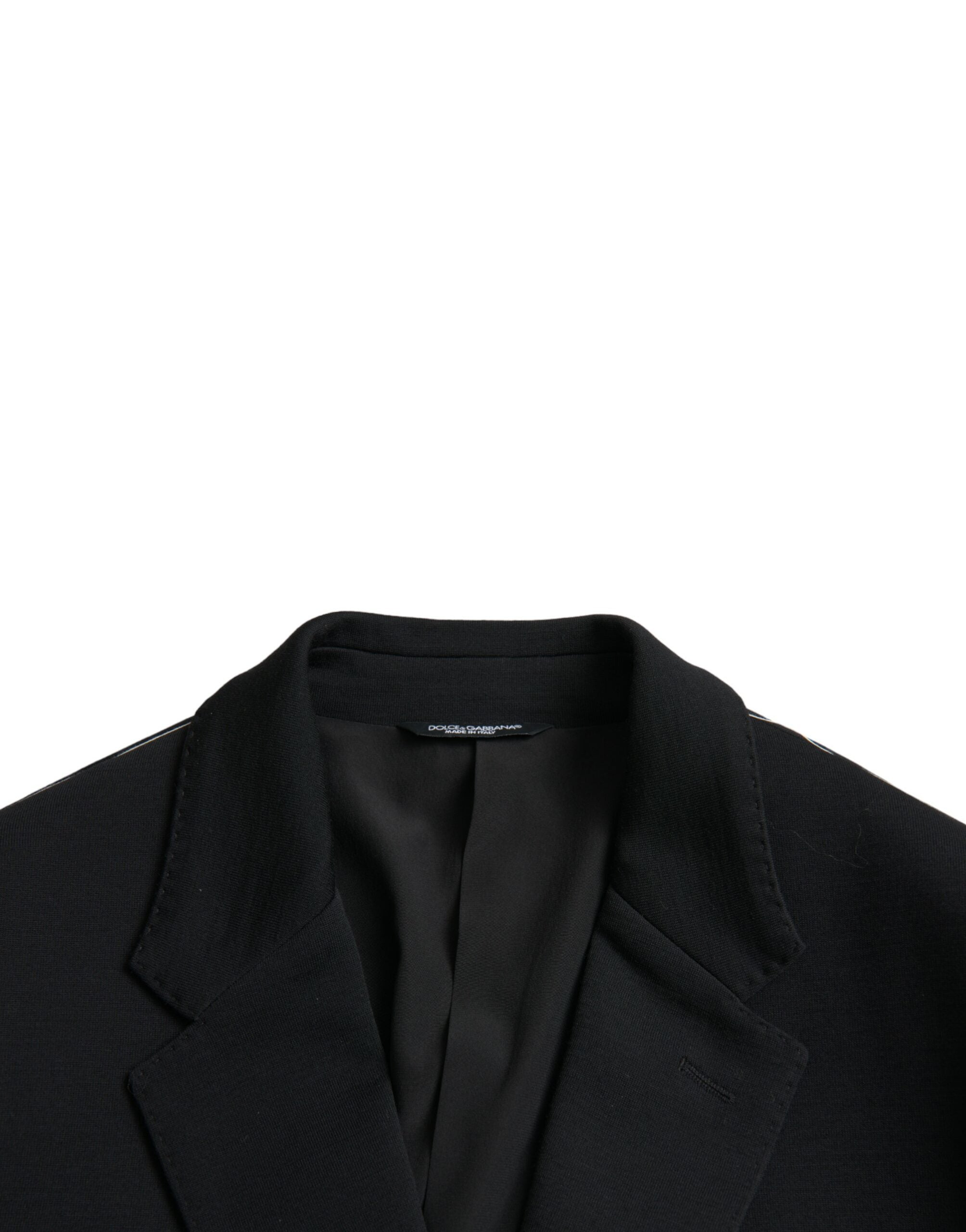 Manteau blazer noir en laine Dolce & Gabbana, coupe à encolure crantée, avec une seule rangée de boutons.