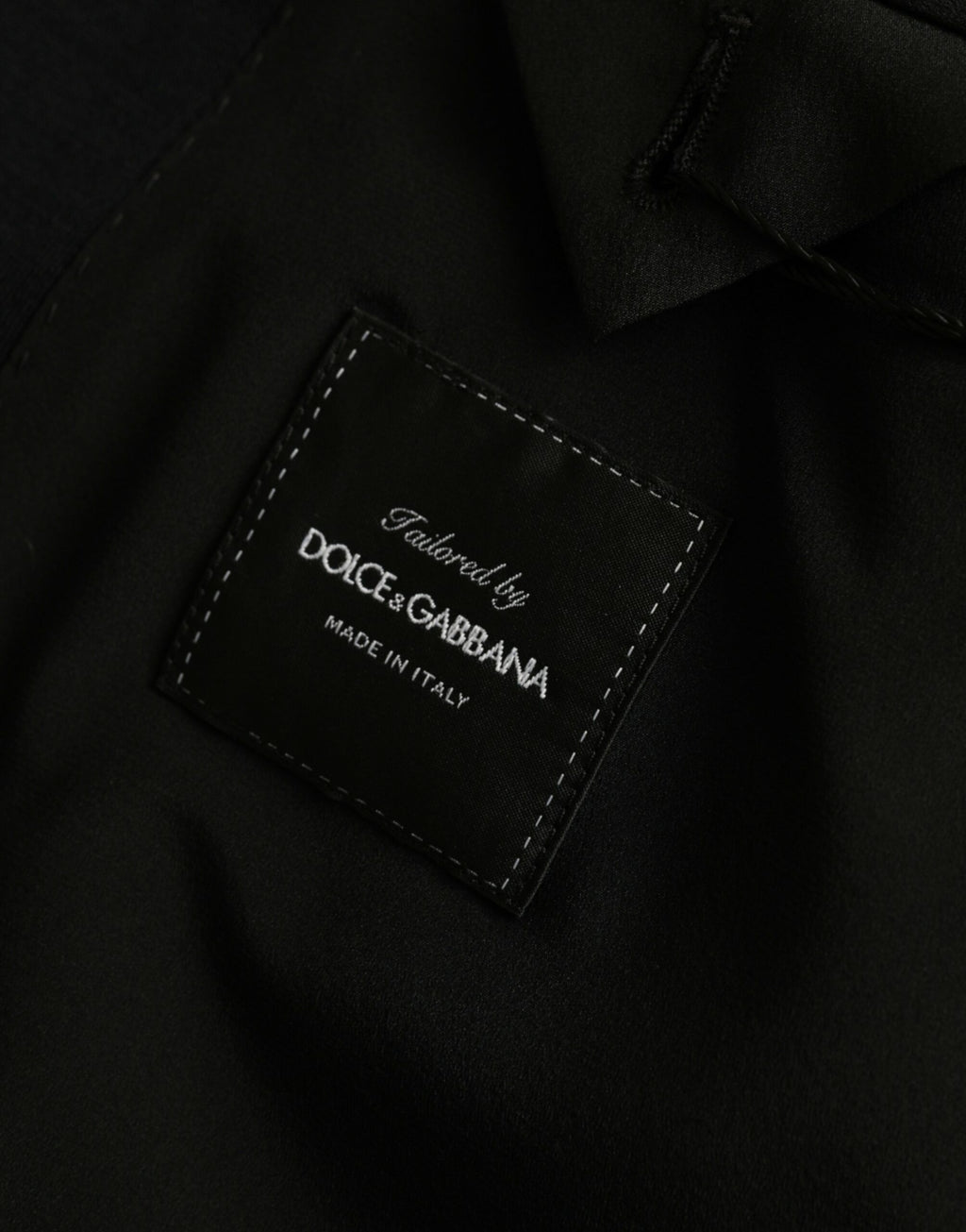 Manteau blazer noir en laine à col cranté et simple boutonnage, Dolce & Gabbana, vue de face.