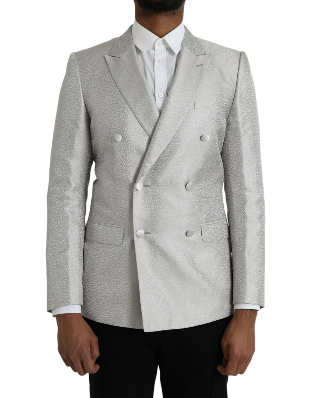 Manteau blazer Dolce & Gabbana Martini blanc à double boutonnage, élégant, en tissu léger, porté sur un mannequin.