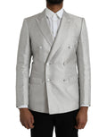 Manteau blazer Dolce & Gabbana Martini blanc à double boutonnage, élégant, en tissu léger, porté sur un mannequin.