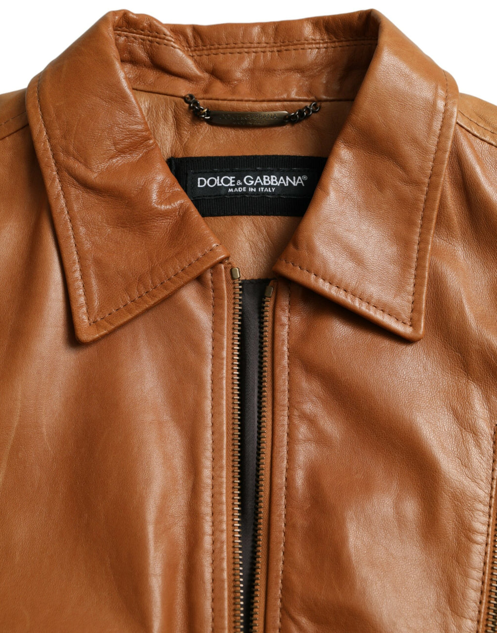 Blouson Dolce & Gabbana en cuir d'agneau marron avec fermeture éclair complète, mode élégante et sophistiquée.