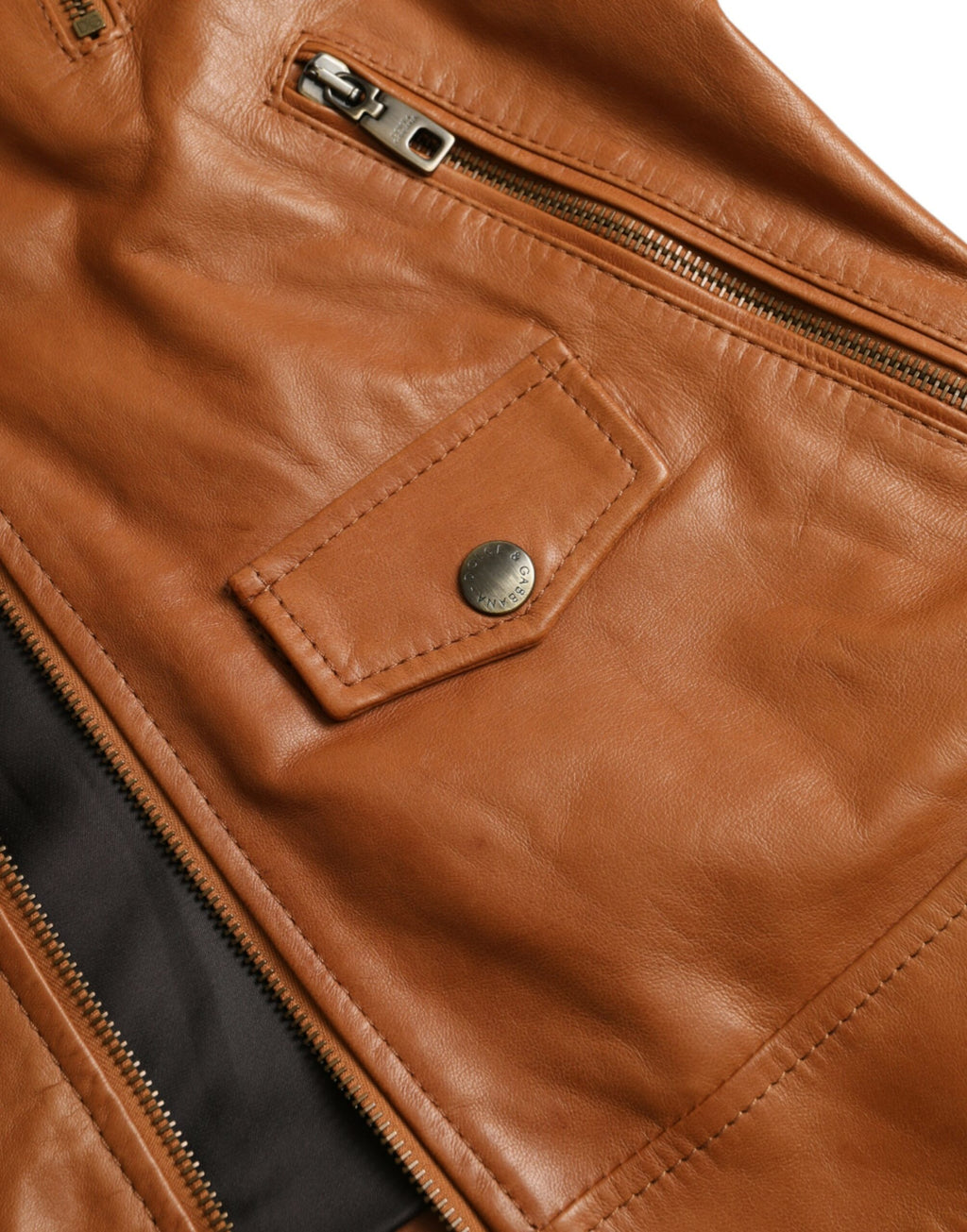 Veste blouson Dolce & Gabbana en cuir d'agneau marron avec fermeture éclair complète, style élégant et moderne.