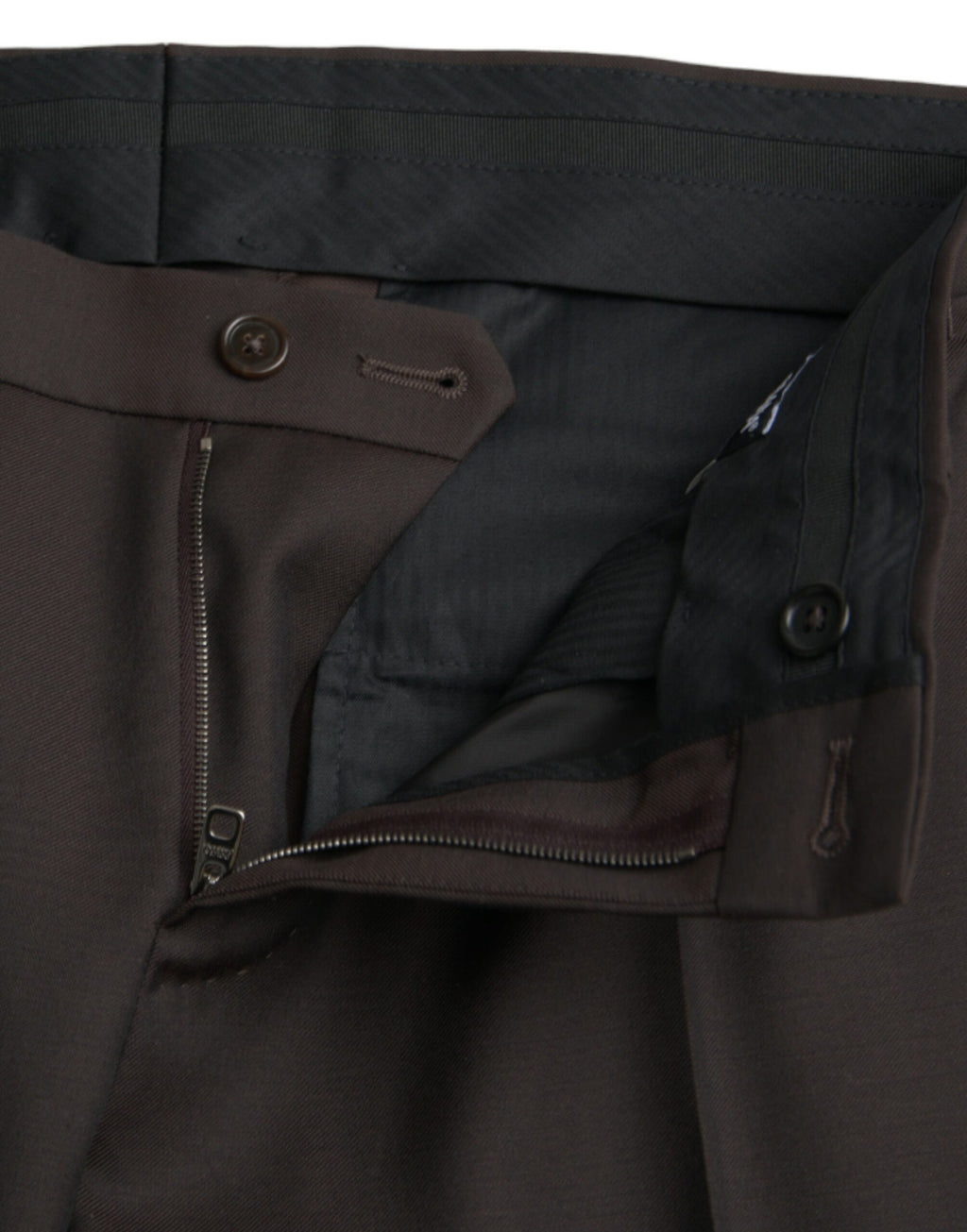 Pantalon formel en laine marron foncé Dolce & Gabbana, coupe slim, vue de face sur un fond blanc