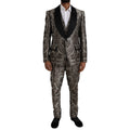 Costume trois pièces Dolce & Gabbana en jacquard floral marron, élégant et formel, avec veste, pantalon et gilet assortis.
