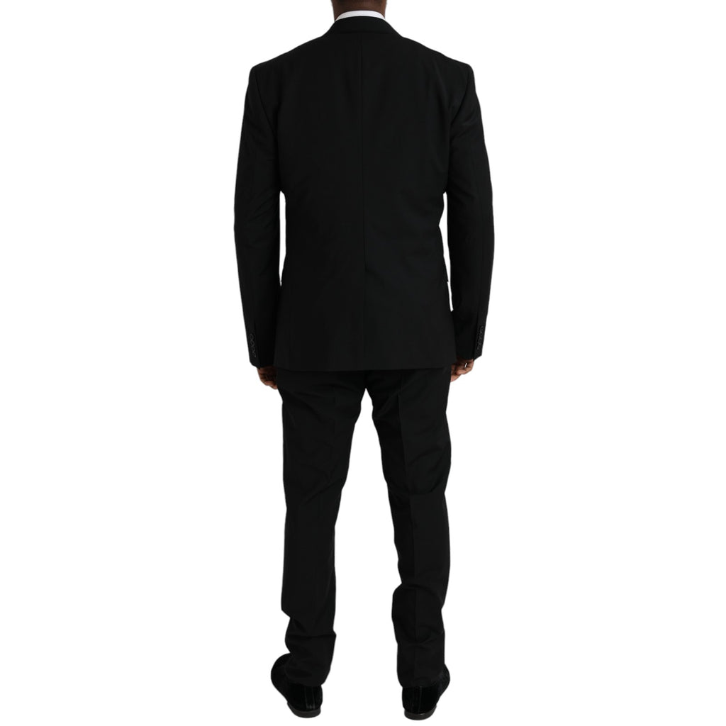 Costume formel trois pièces en polyester noir de Dolce & Gabbana, comprenant veste, pantalon et gilet élégant.