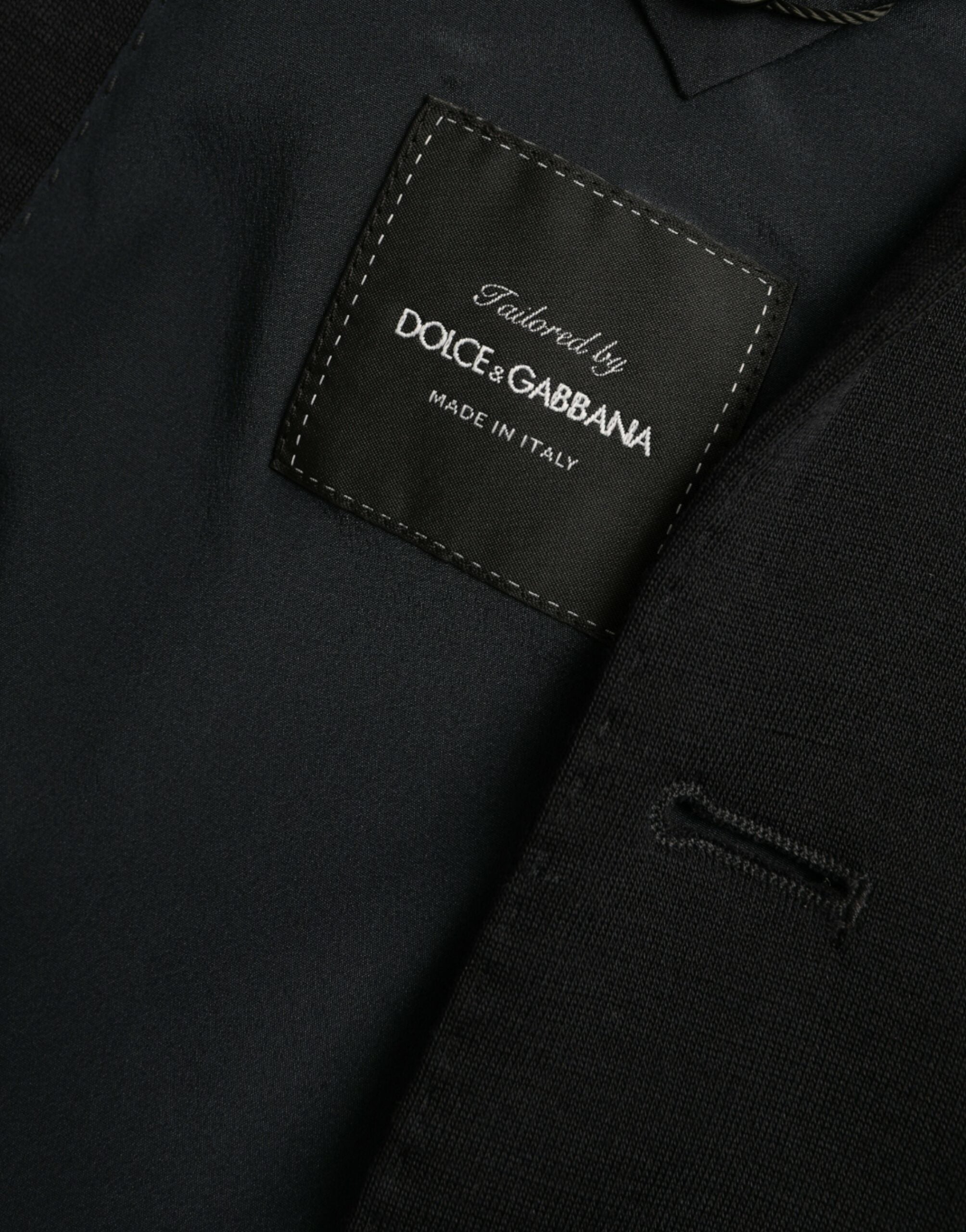 Manteau blazer noir en laine à un seul bouton de Dolce & Gabbana, style élégant et coupe classique, visible sur l'image.
