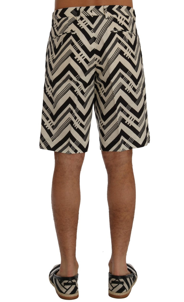 Shorts en coton et lin blancs et noirs à rayures de Dolce & Gabbana, style décontracté et élégant.