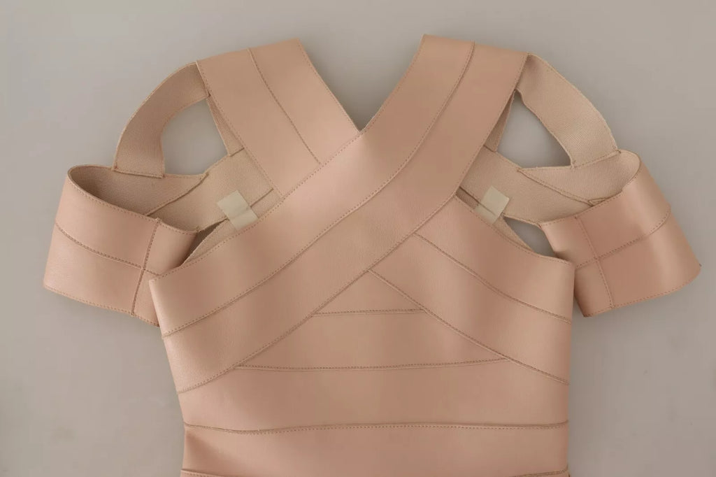 Robe courte en cuir beige de Dsquared² avec épaules ouvertes, silhouette moulante et élégante, pour un look chic et moderne.