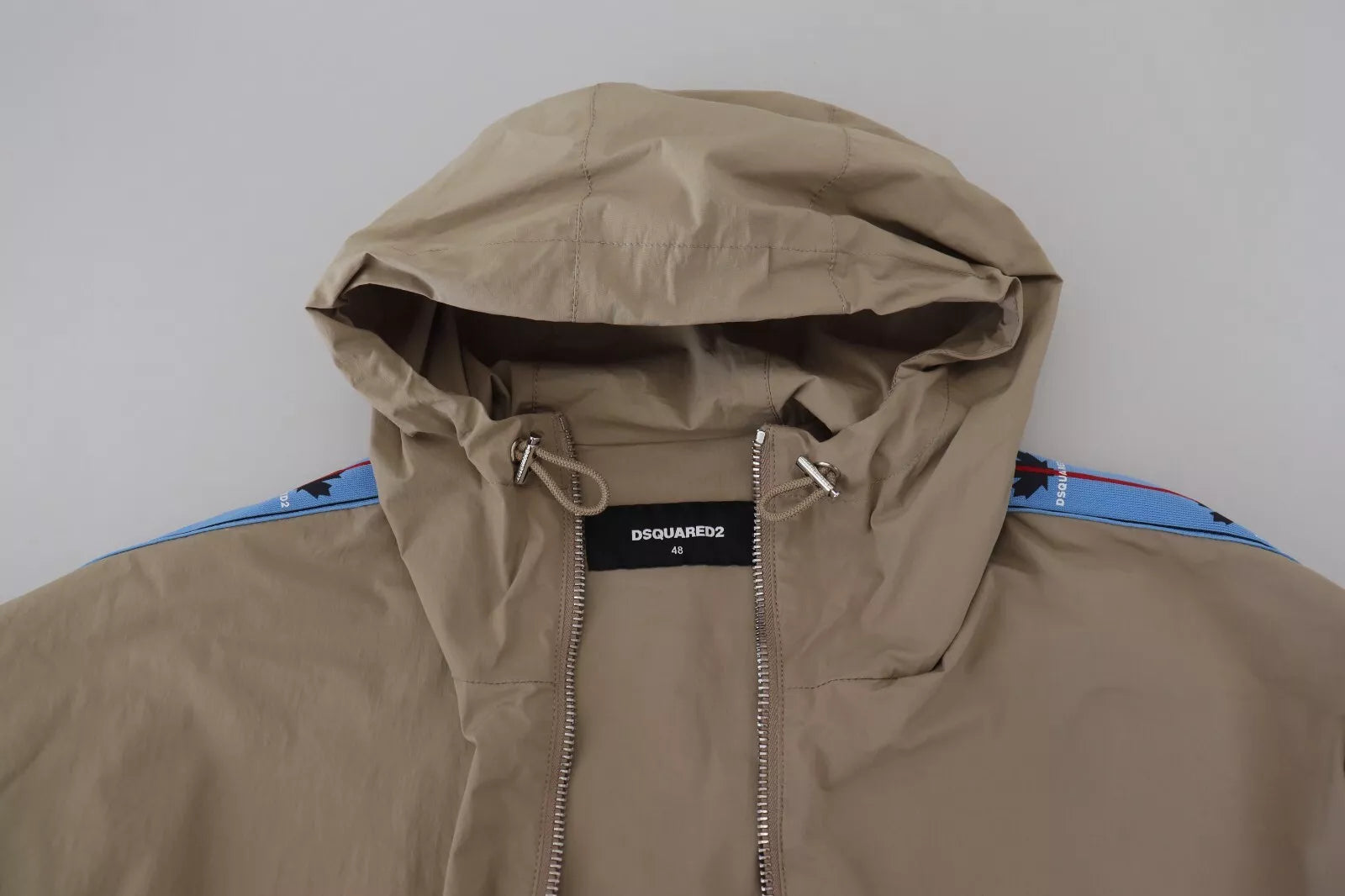 Veste à capuche zippée en gris et marron de Dsquared², manches longues et design décontracté.