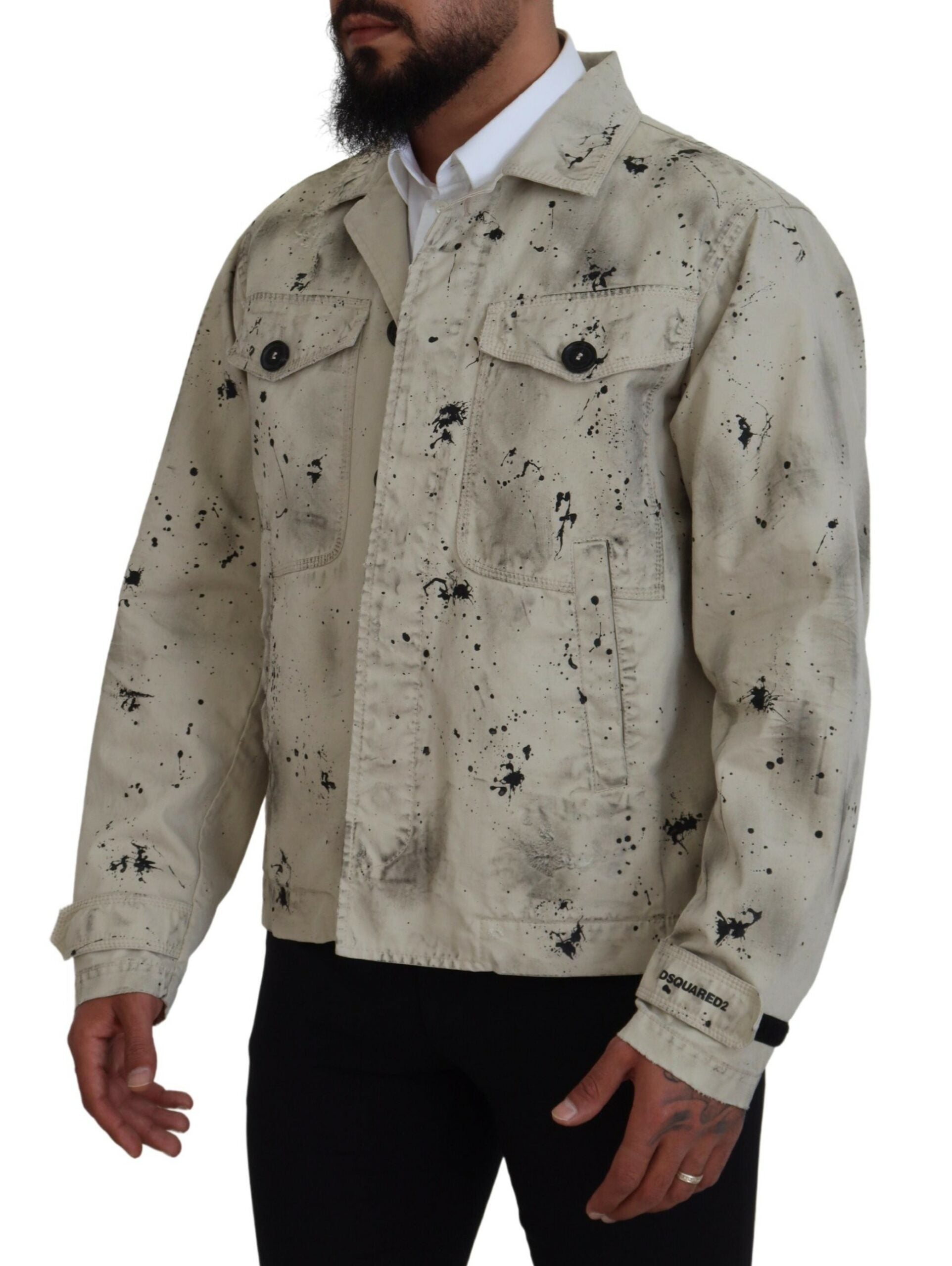 Veste en jean décontractée Dsquared² blanche, noire avec éclaboussures de peinture, style casual et tendance.