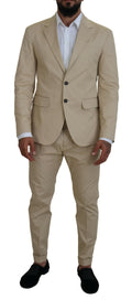 Costume deux pièces en coton beige de Dsquared², veste à boutonnières simples, pantalon assorti, style élégant et moderne