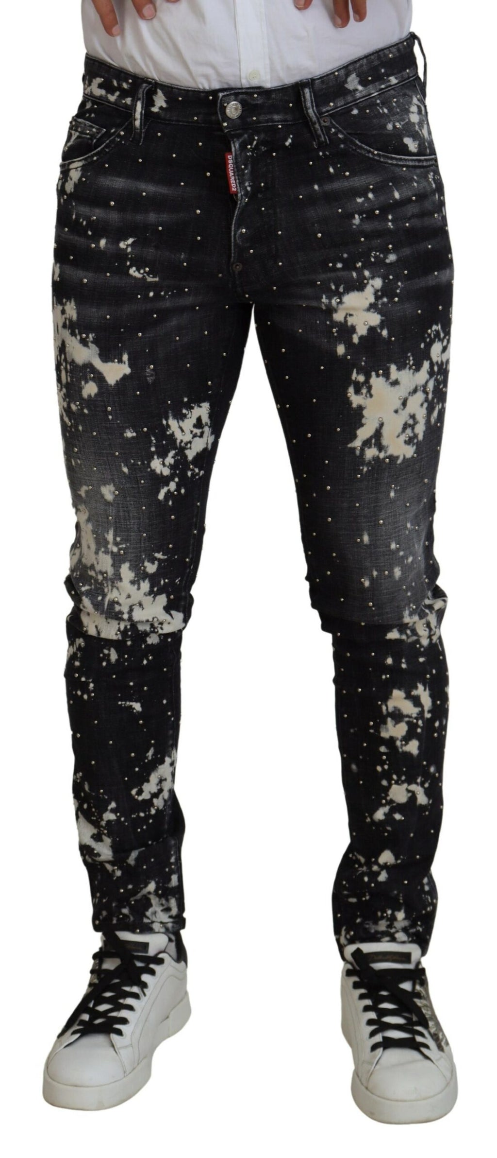 Jeans décontractés en denim blanc délavé avec éclaboussures de couleur noire, de la marque Dsquared².