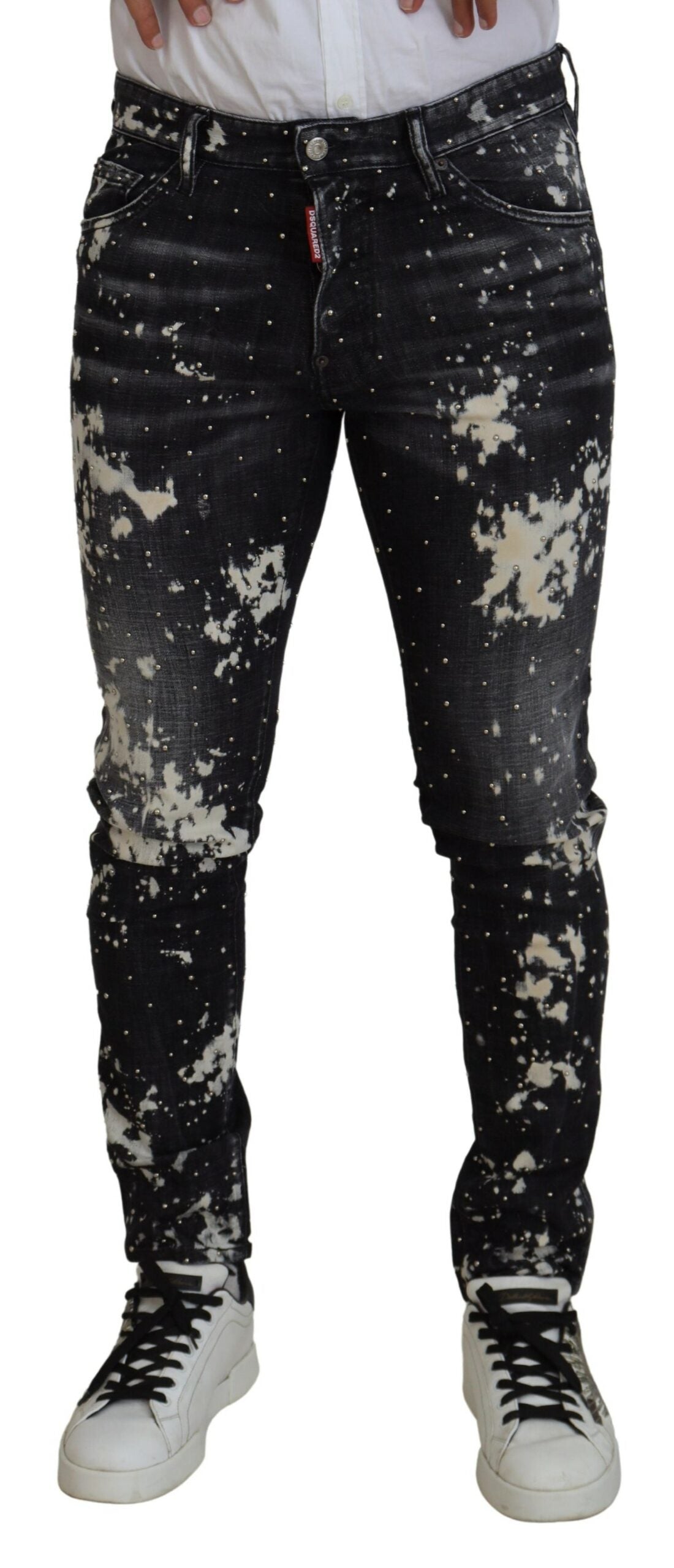 Jeans décontractés en denim blanc délavé avec éclaboussures de couleur noire, de la marque Dsquared².
