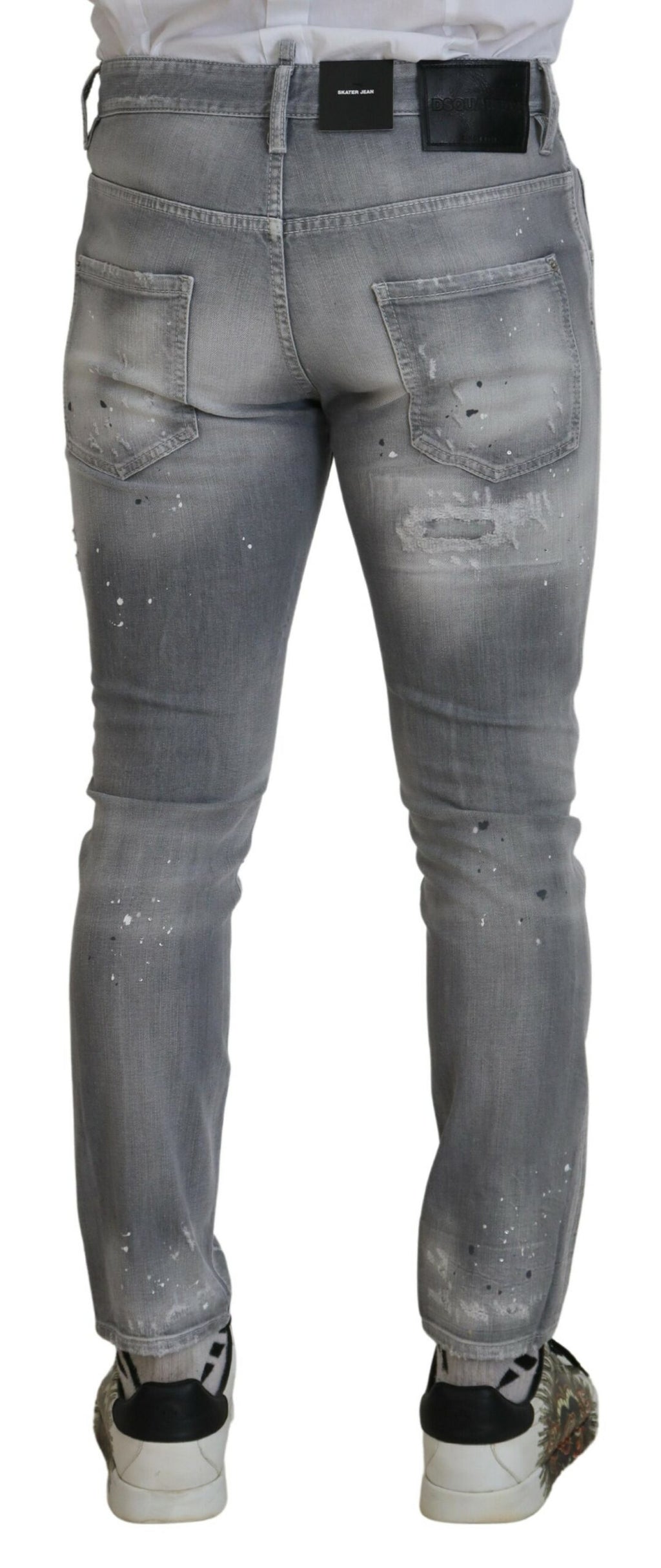 Jeans homme en coton gris délavé, coupe slim, de la marque Dsquared², avec une finition décontractée et style casual.