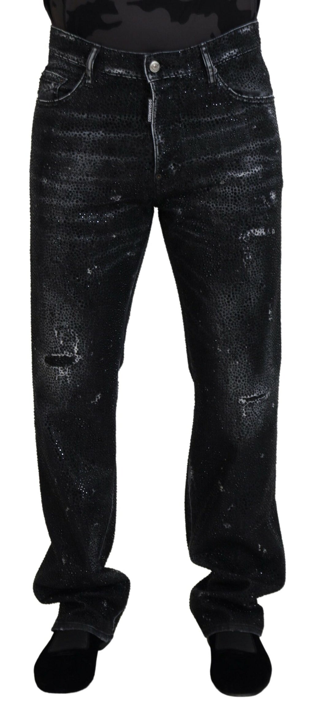 Jeans en denim déchiré noir de Dsquared² ornés de cristaux brillants et détails usés, style streetwear élégant.