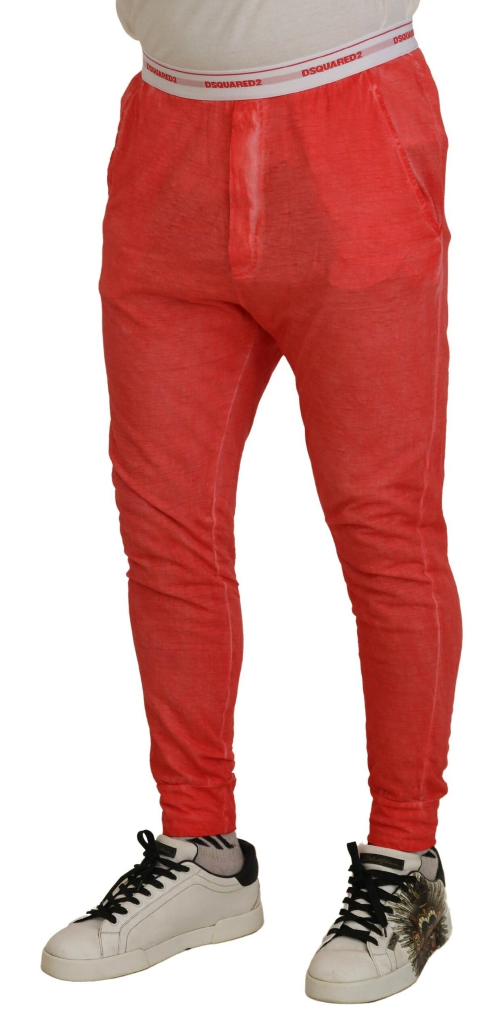 Pantalon homme Dsquared² en coton orange avec taille élastique et logo, mode décontractée et confortable.