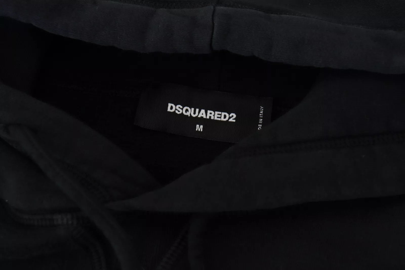 Sweat à capuche en coton tie-dye noir de Dsquared², pull décontracté avec logo et design tendance visible sur l'image.