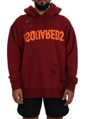 Sweat à capuche en coton marron avec déchirures et imprimé, par Dsquared², vue de face.