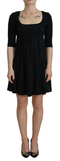Robe noire en acétate Dsquared² à manches courtes, coupe en ligne A, style robe fourreau élégante et moderne.