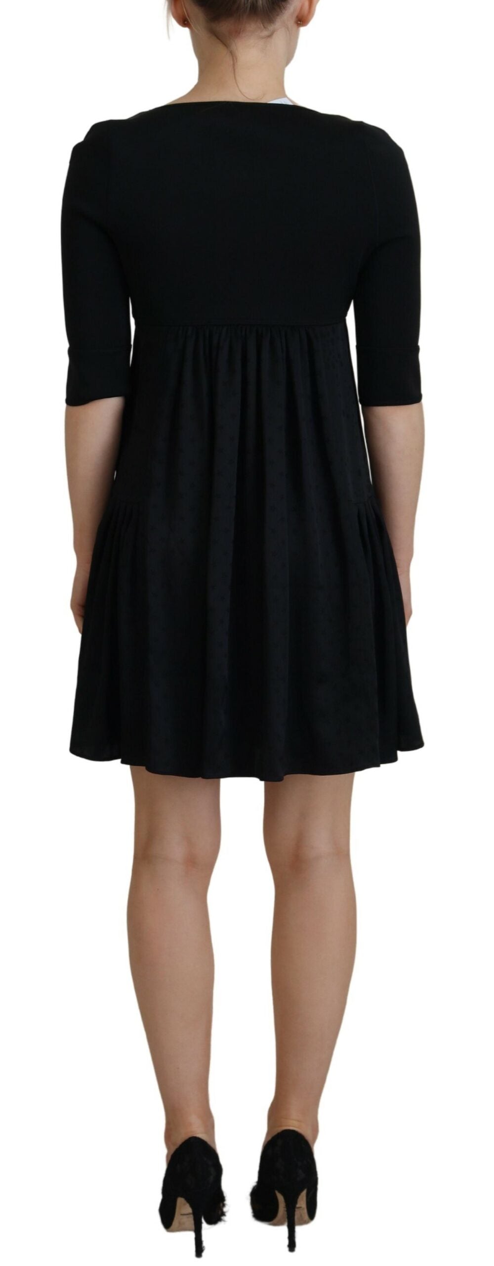 Robe trapèze noire en acétate de Dsquared² avec manches courtes, coupe élégante et style tendance.